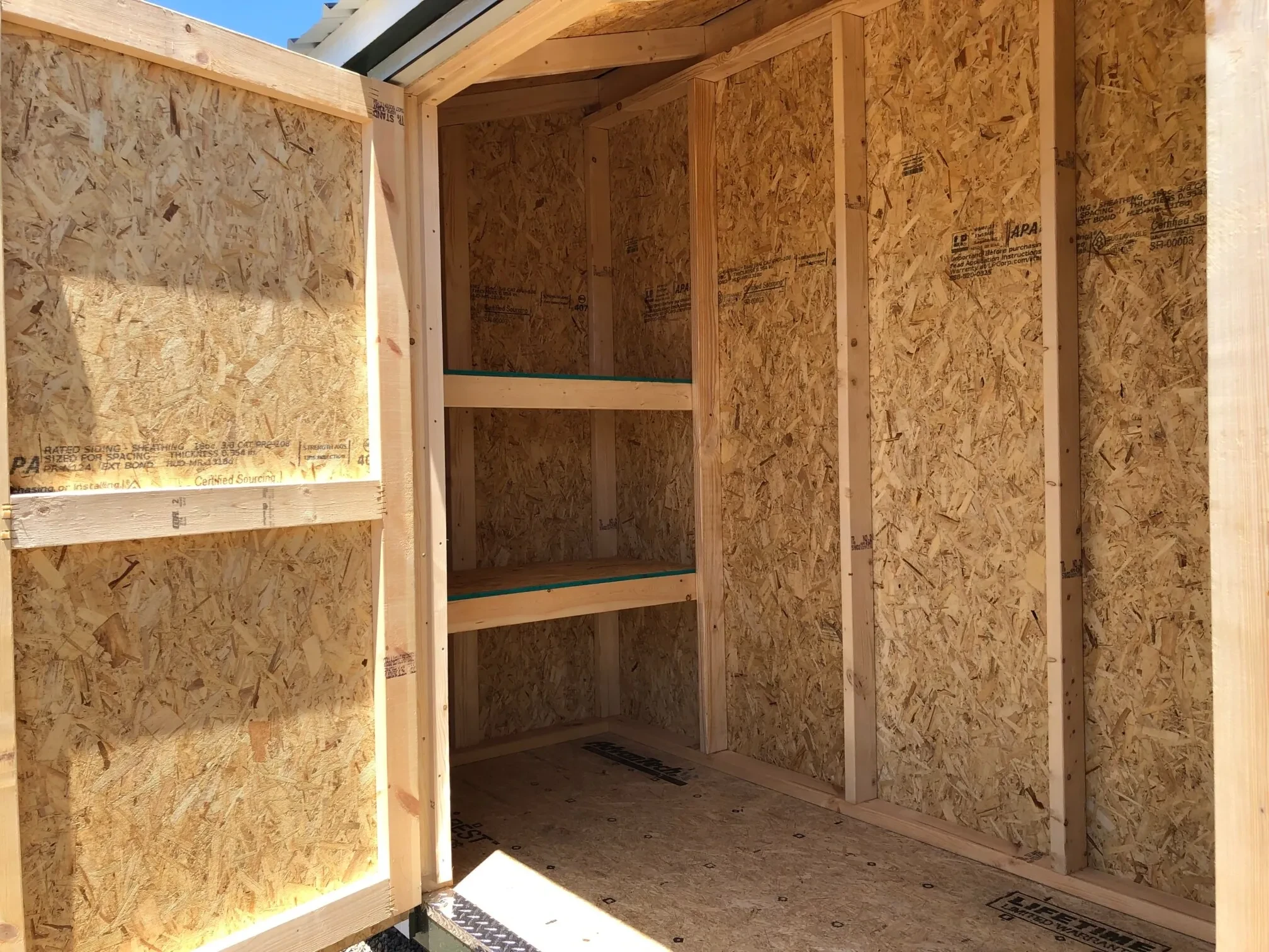 Interior view of 4x12 shed showing double shelves.