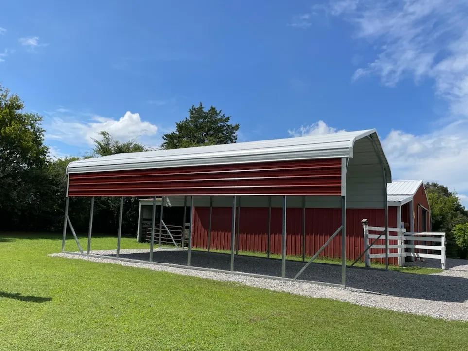 A large red and white RV Cover