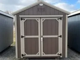 the bronze utility clay roof and trim wood shed with double doors