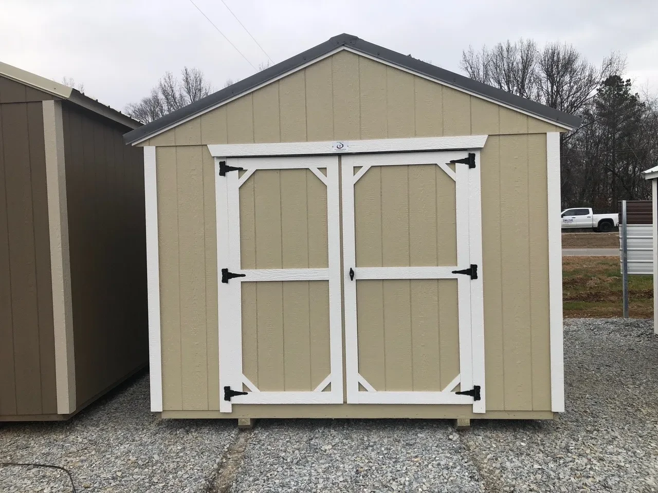 medium size wood shed with double doors