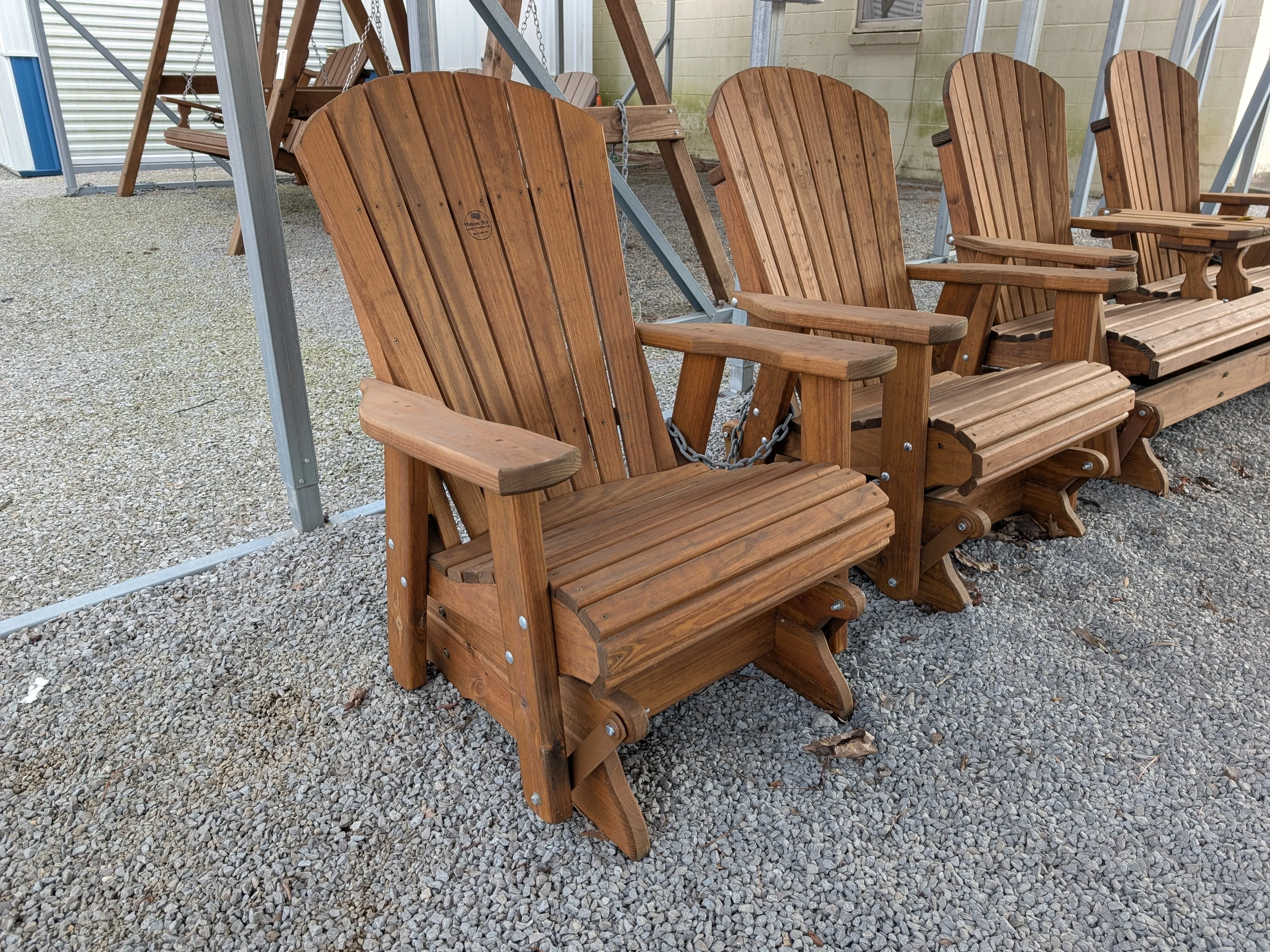 a wood chair that has been stained and sealed. It can glide back and forth