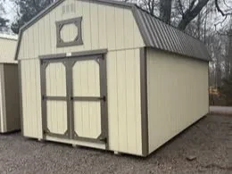 side view exterior bronze roof, stone siding, bronze trim