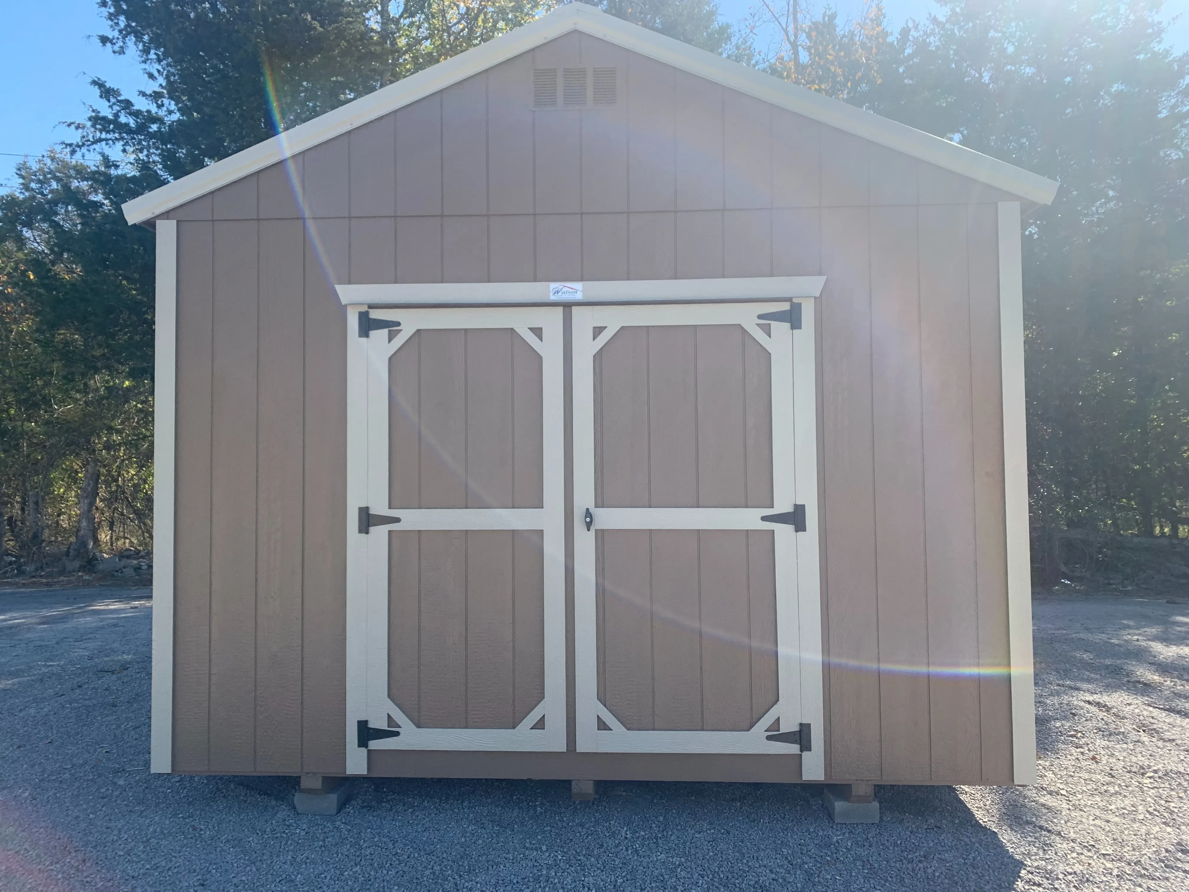 Premium 12x20 Utility painted stone, white trim, charcoal metal roof 72" doors