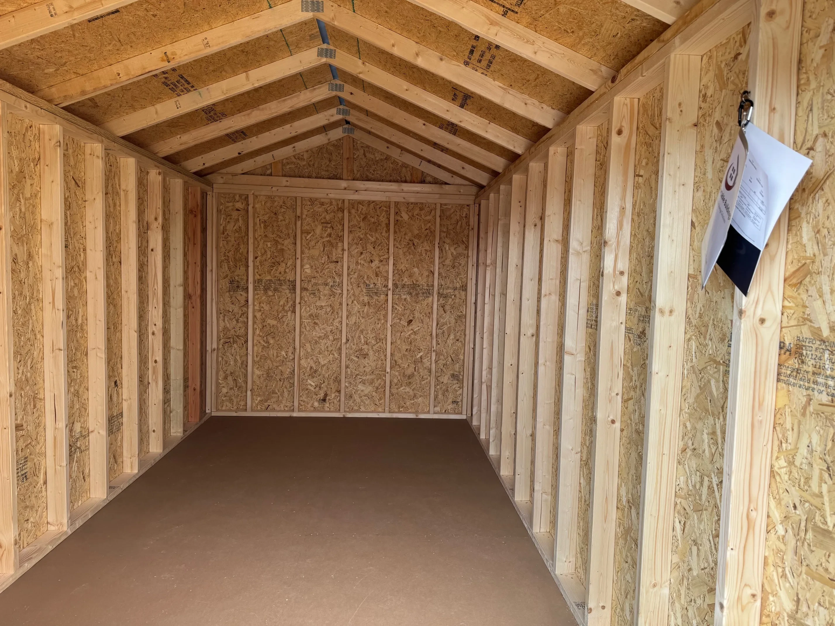 Inside of 8 X 16 Zook Gray Classic Wood Utility Shed With Double Doors, White Trim and Charcoal Roof