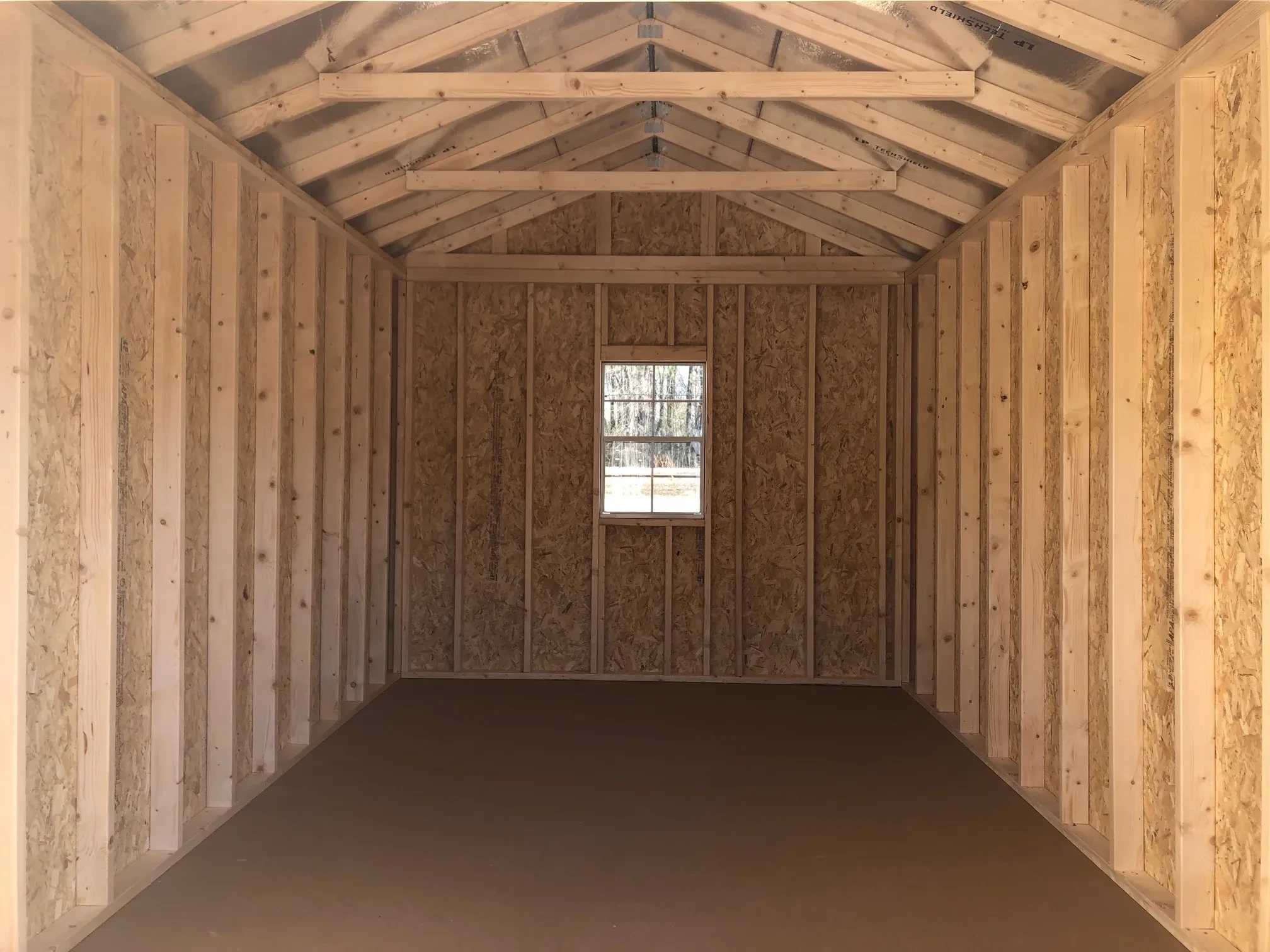a view of the inside of a 10x16 storage shed showing the window