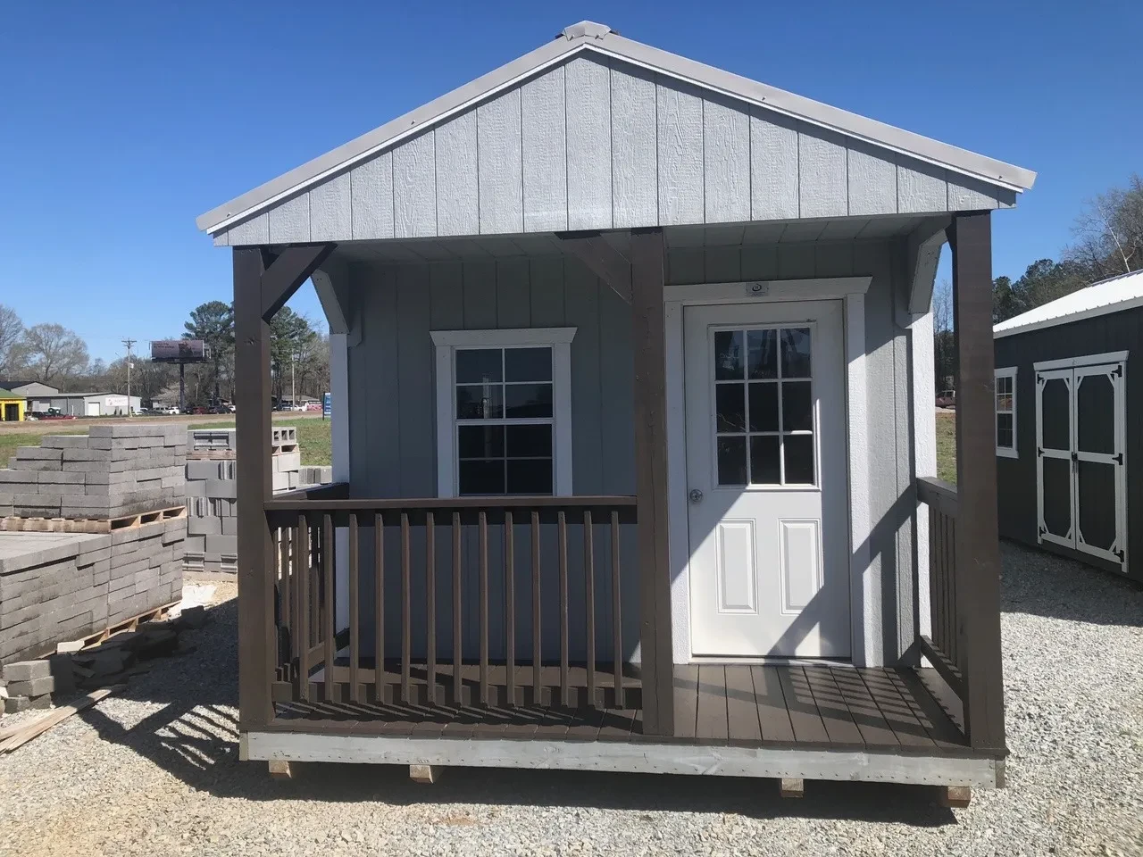 front view of the exterior of a 12x28 cabin showing the door and a windwo