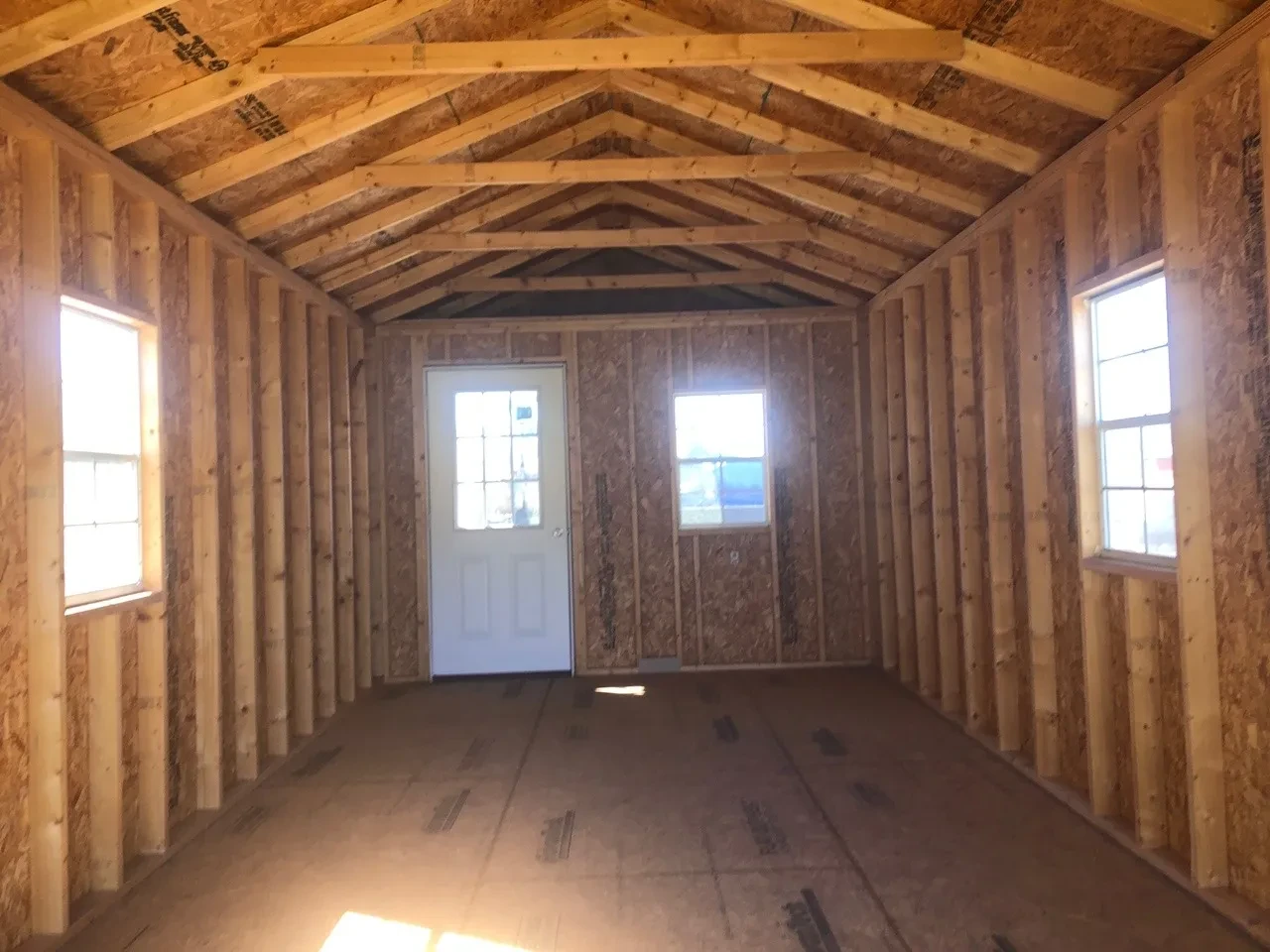 interior of 12x28 cabin showing the door and windows