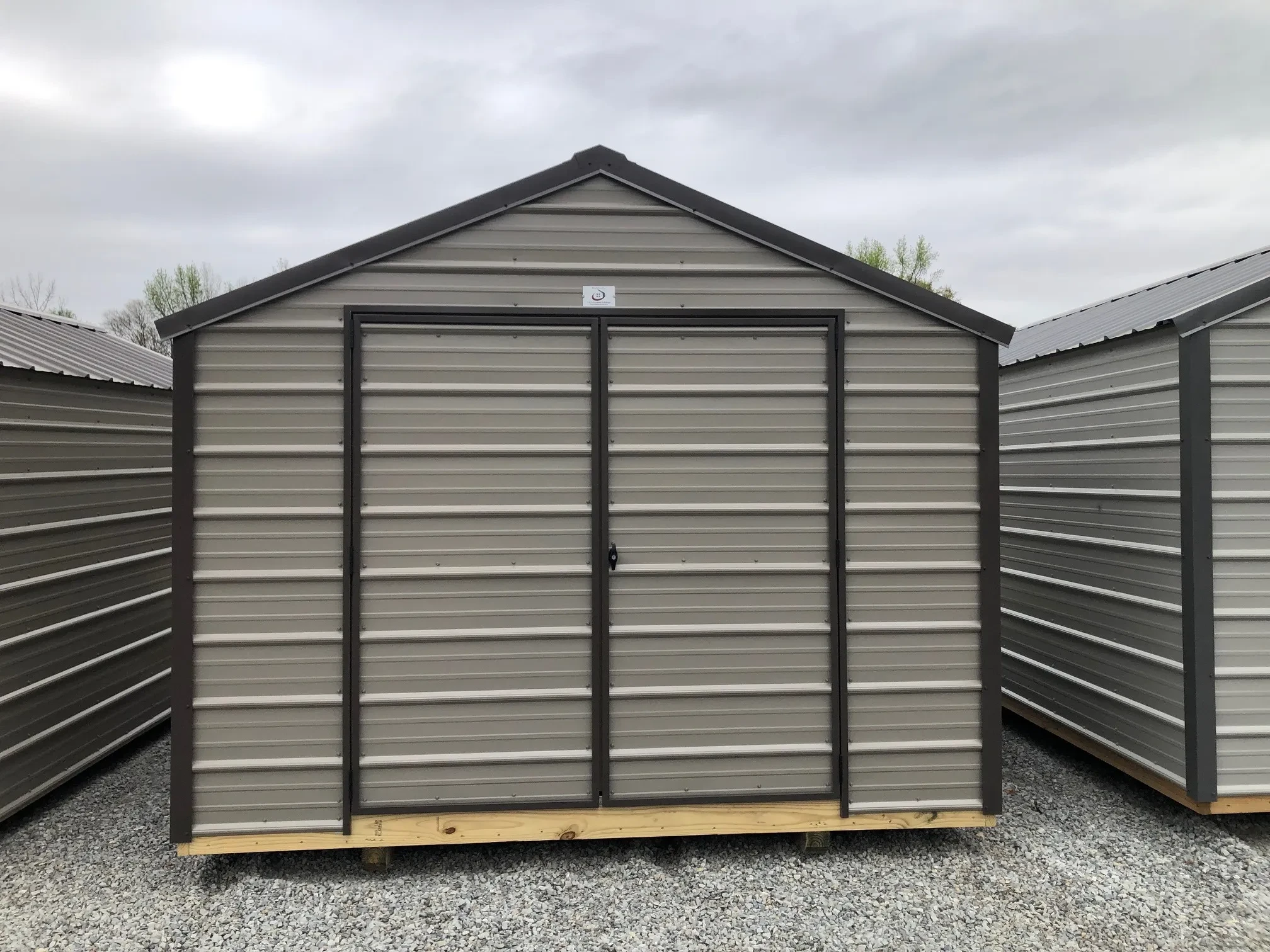 exterior of 10x12 metal shed showing double doors