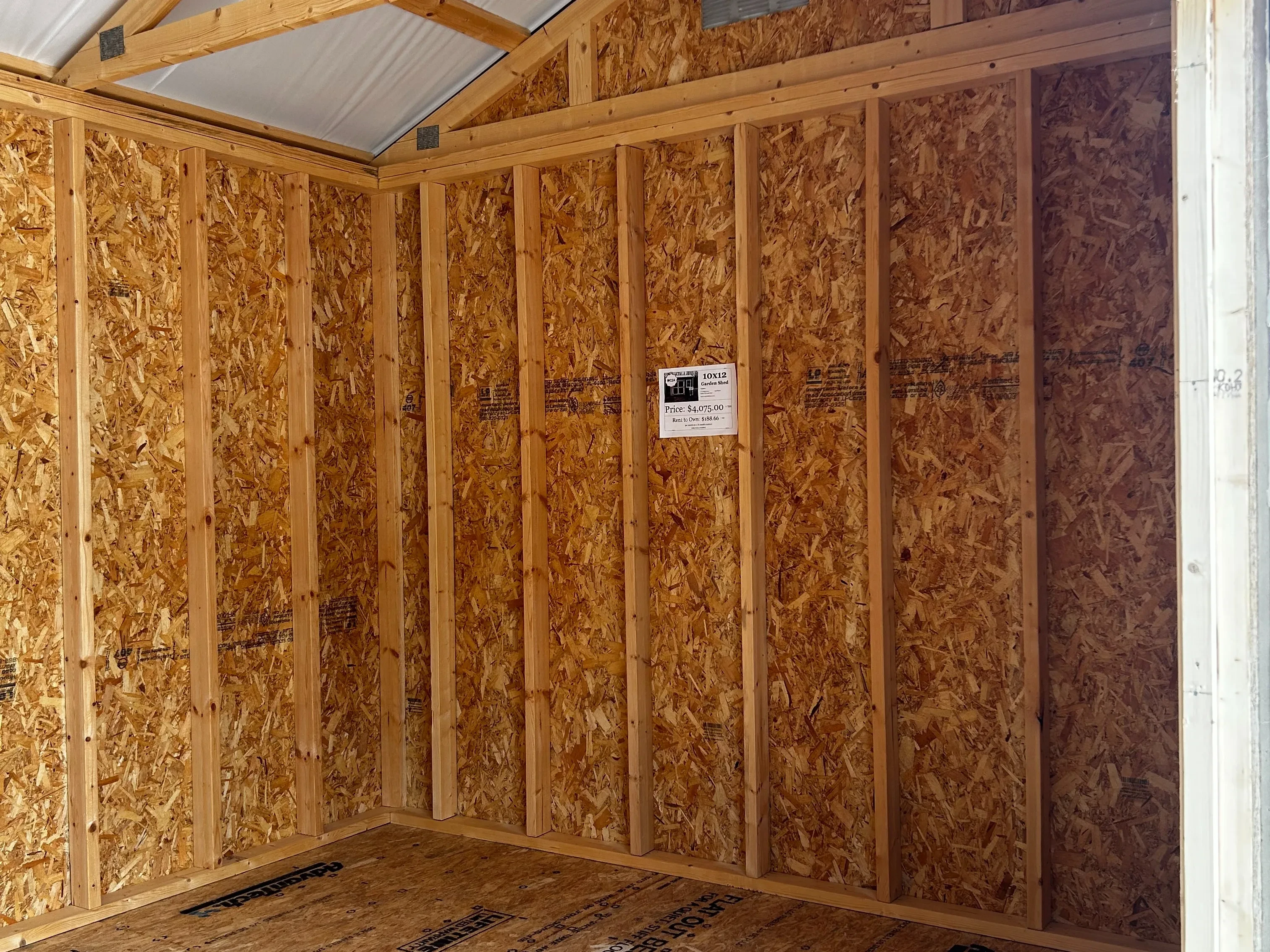 Corner of 10x12 garden shed showing supports and ceiling