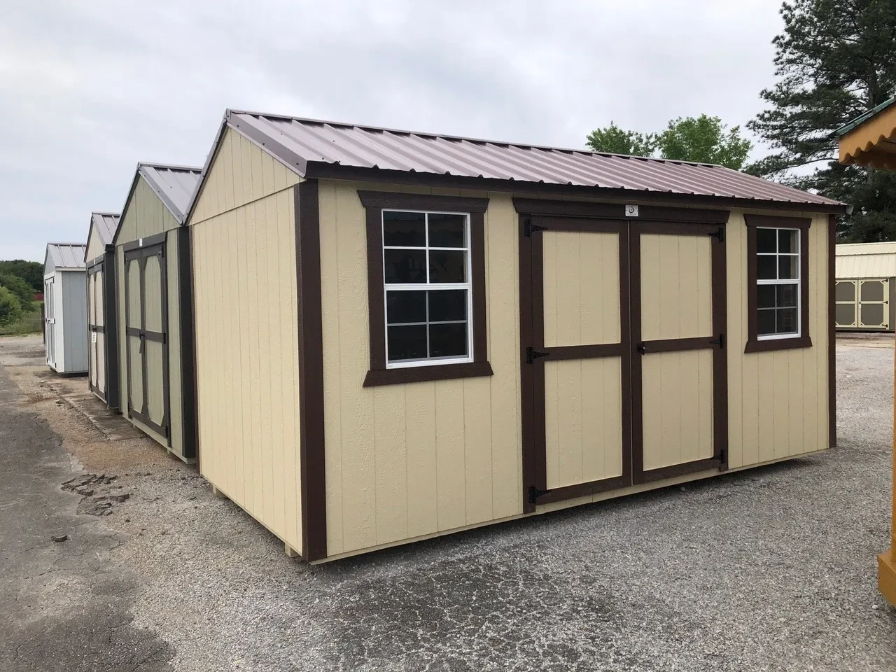 exterior of shed showing double doors and windows