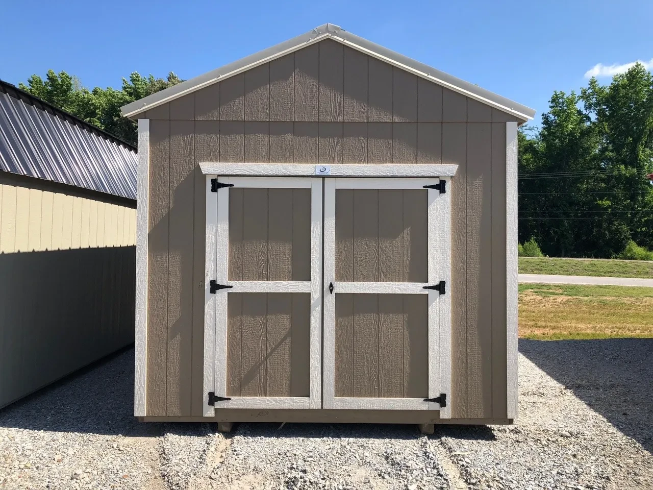 exterior of 10x16 utility shed showing double doors
