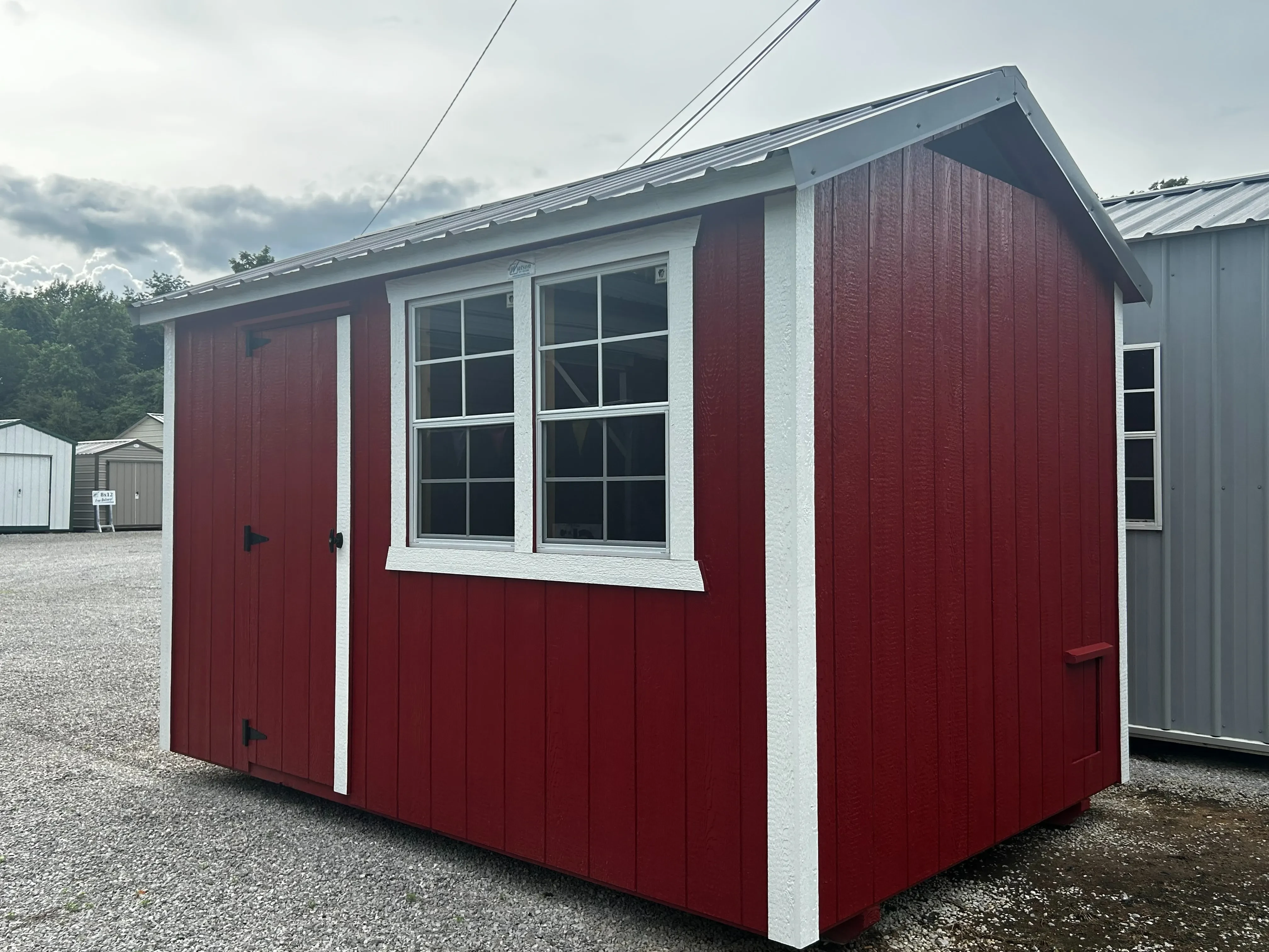 Right side of 8x12 chicken coop showing entry/exit door