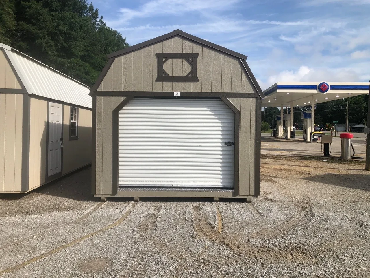 exterior of 12x24 lofted barn garage showing rollup door
