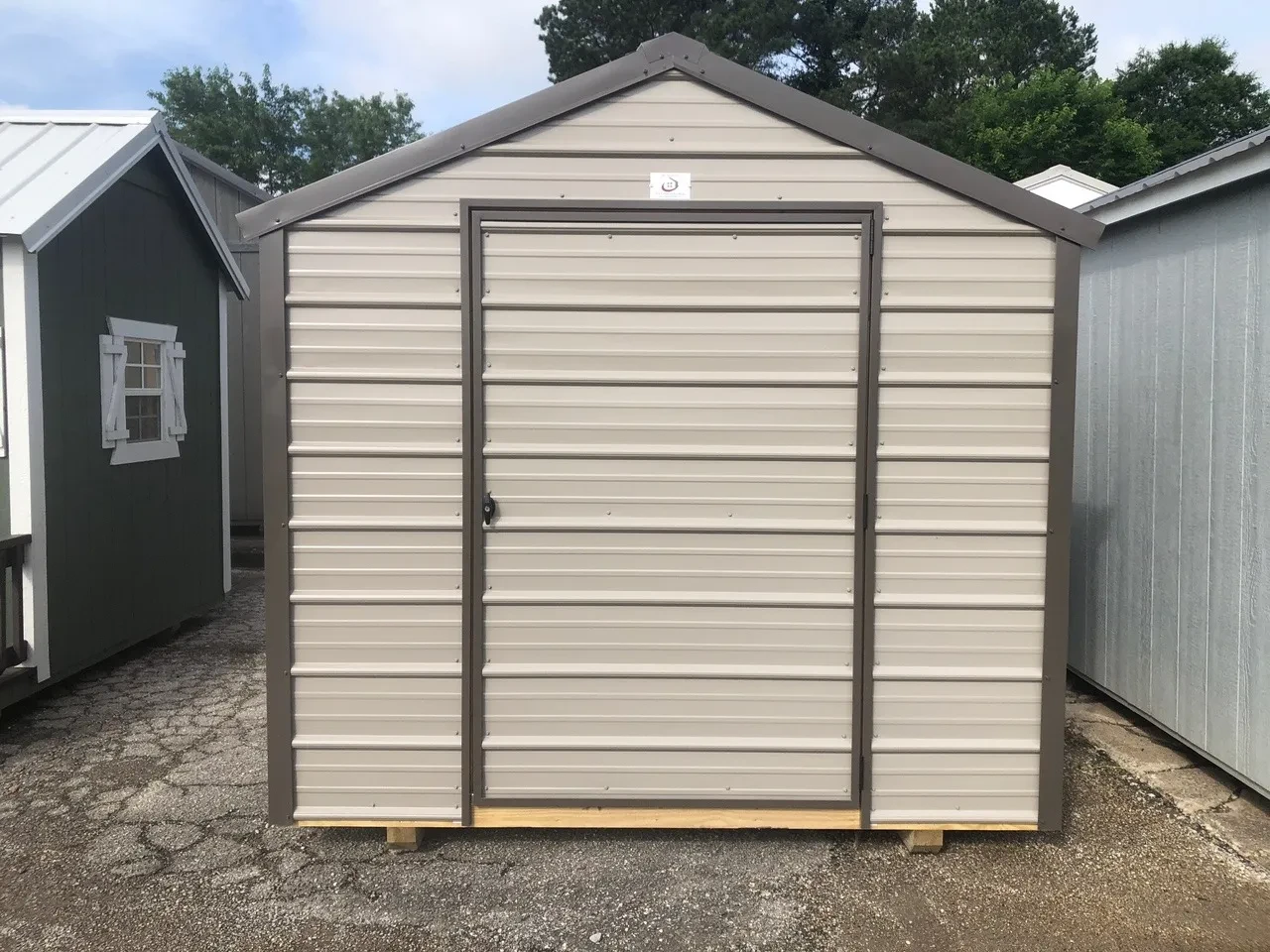 exterior of 8x12 metal utility shed showing a single door