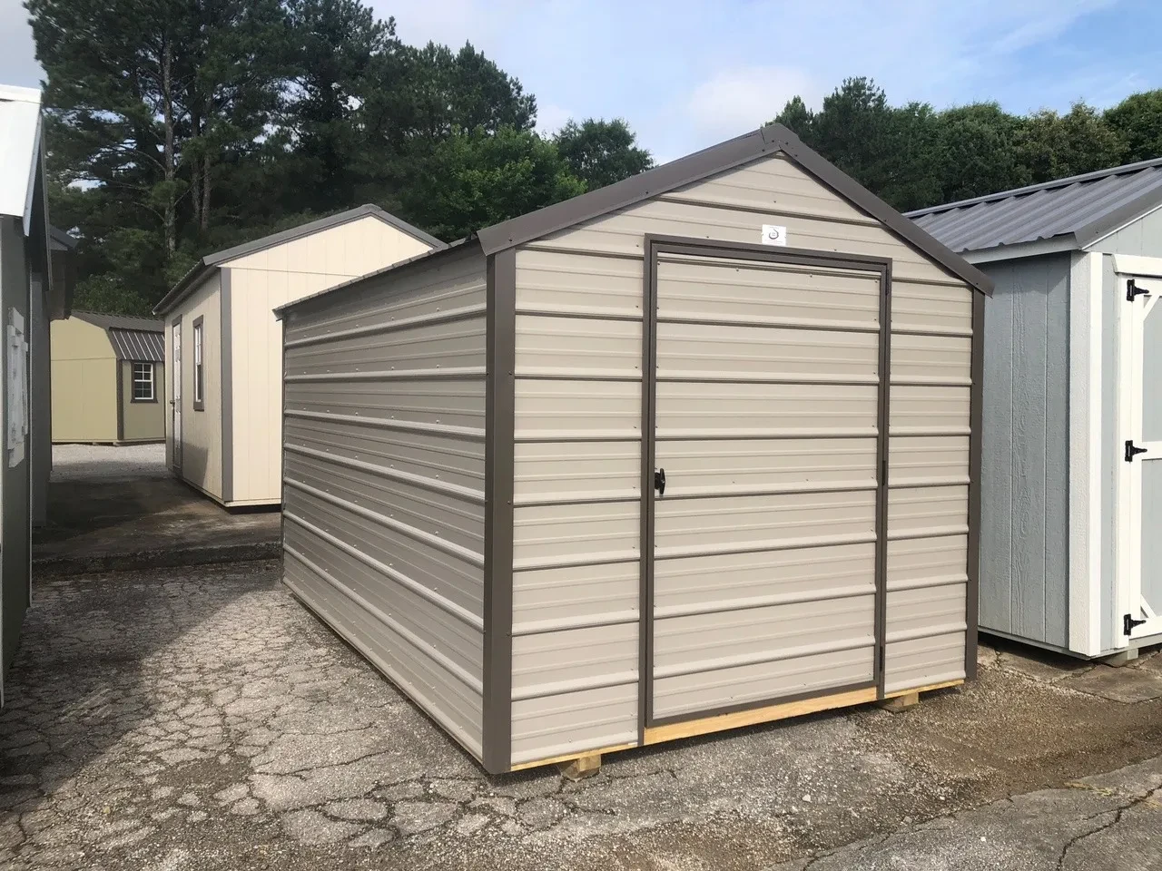 exterior of 8x12 metal utility shed showing a single door