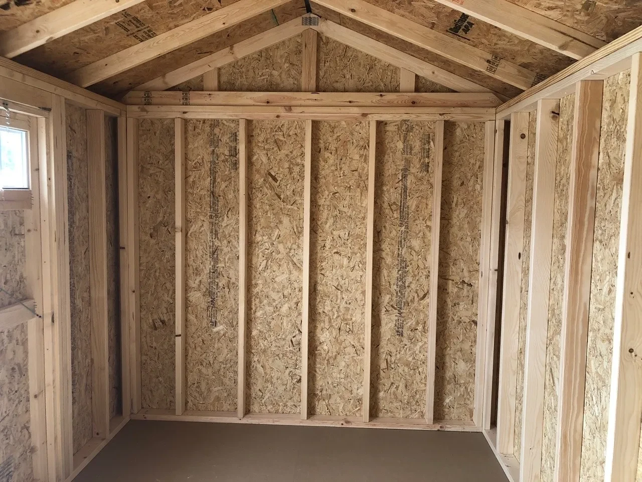 interior of 8x12 garden shed showing part of the door