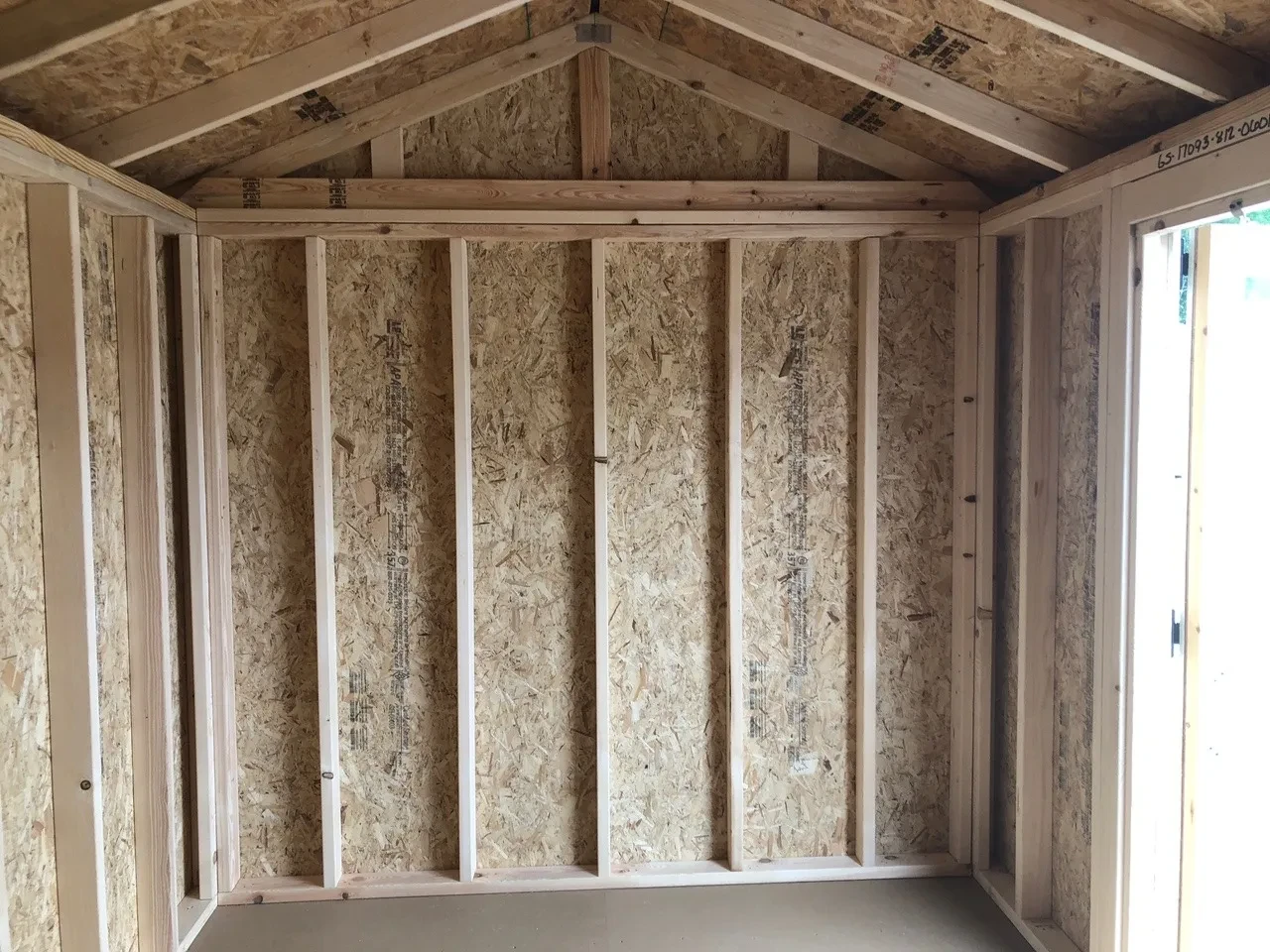 interior of 8x12 garden shed showing part of the door