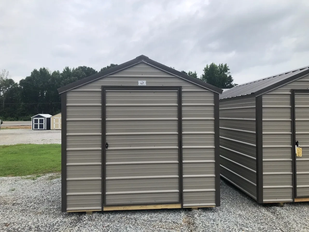 exterior of 8x12 economy metal shed show 48" single door