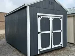 the a slate gray utility shed with double doors and a roof overhang, it also has white roof trim and white wall trim