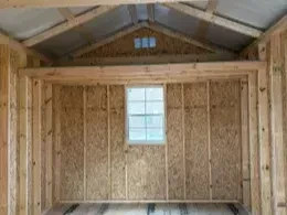 the interior has double doors, window, loft and foil roof