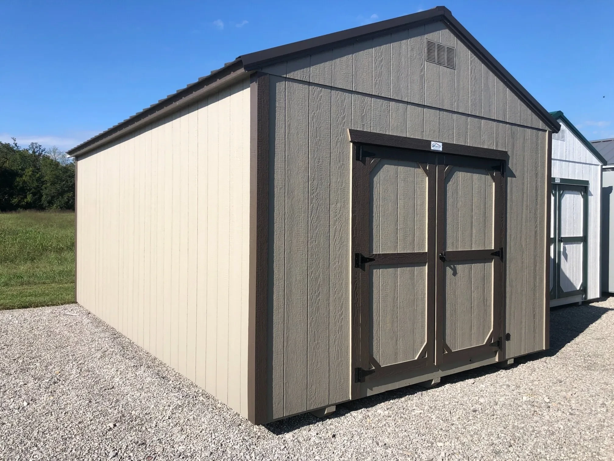 The outside view of a wood shed painted bronze