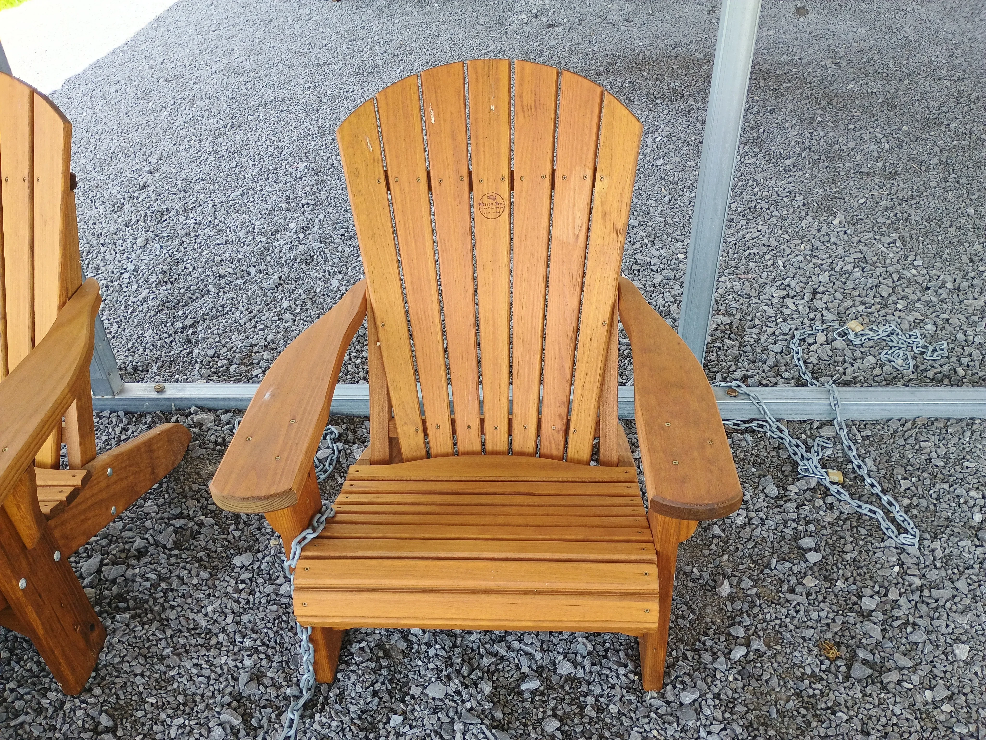 wood stained and sealed adirondack chair