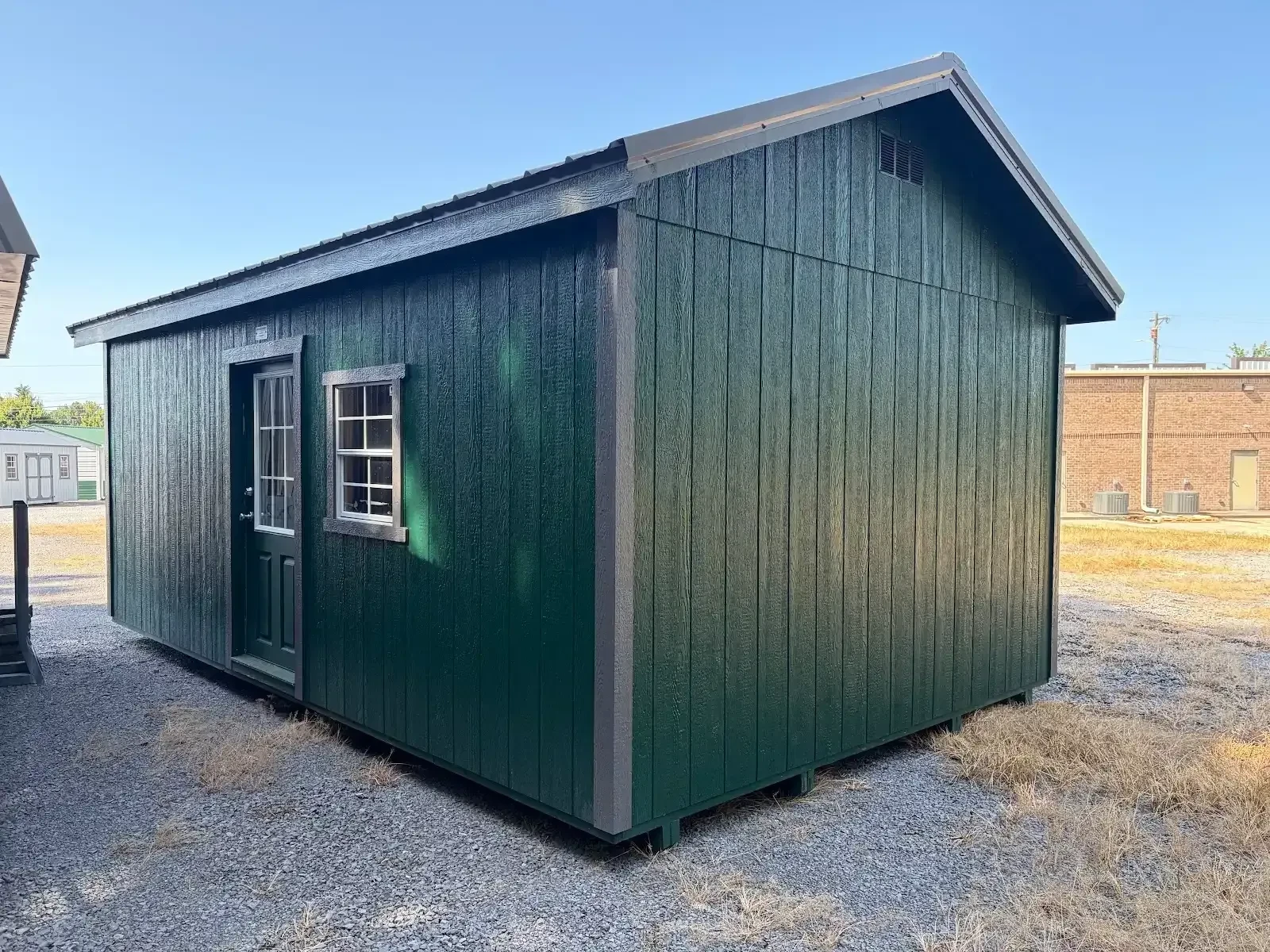 side veiw showing the 9 lite walk in door and the 2x3 window