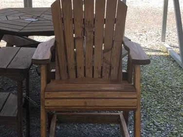 balcony chair beside a balcony end table