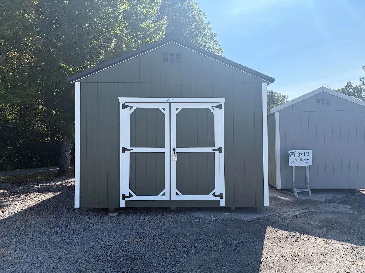 exterior wood utility building garland green siding, white trim & black metal roof, window, double doors