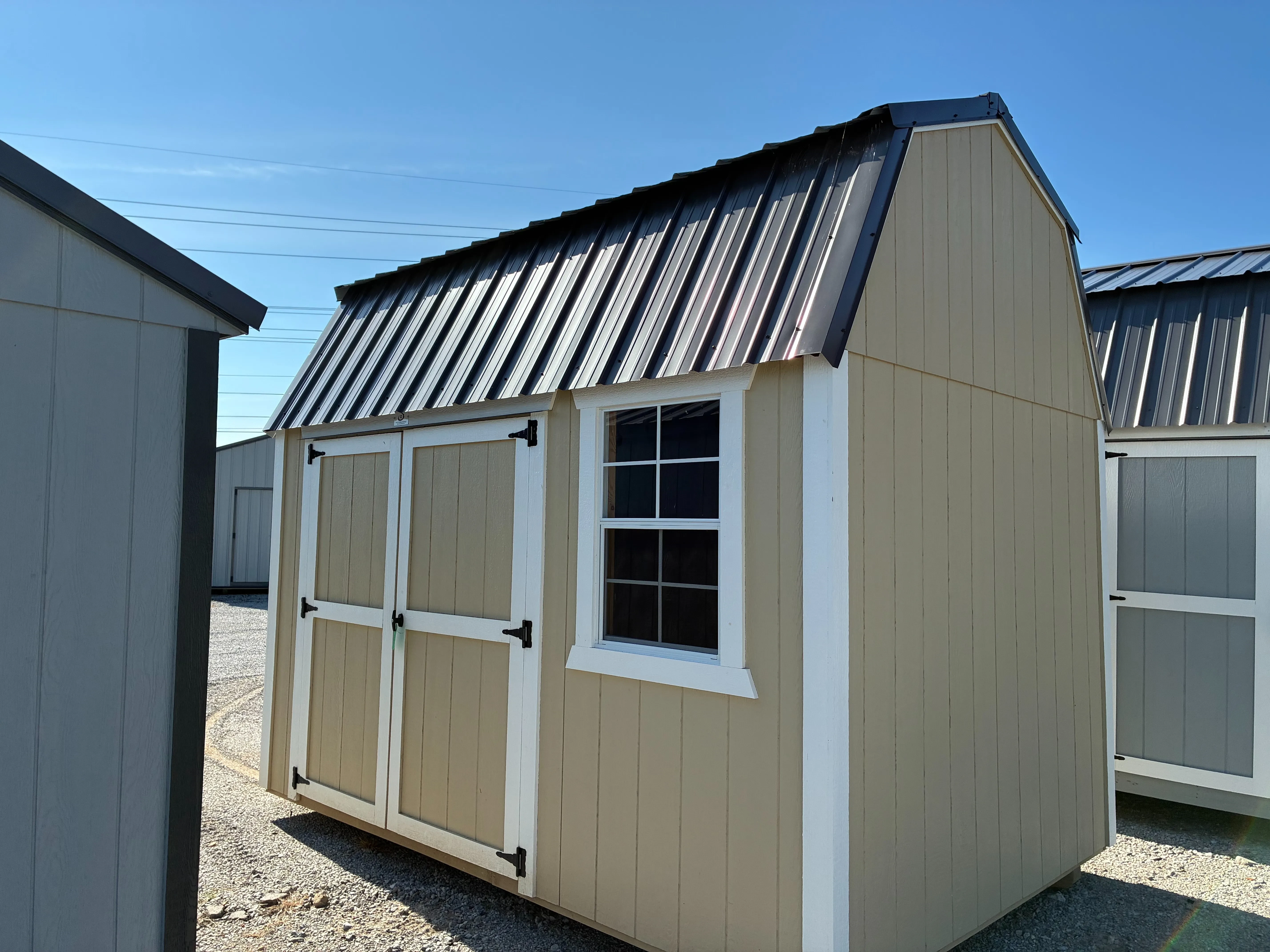 interior8x12 side lofted barn showing double doors and window