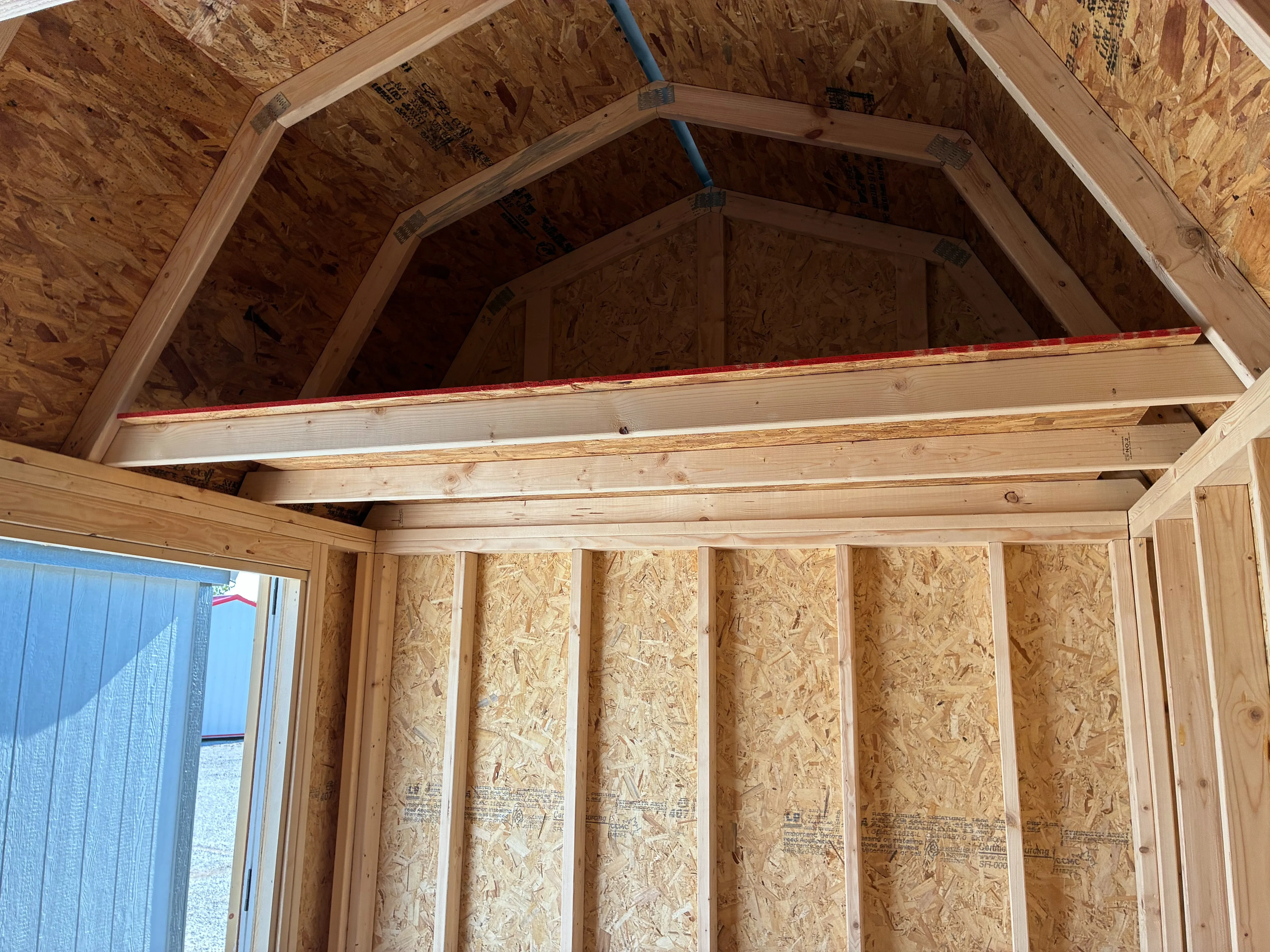 interior of side lofted barn showing loft