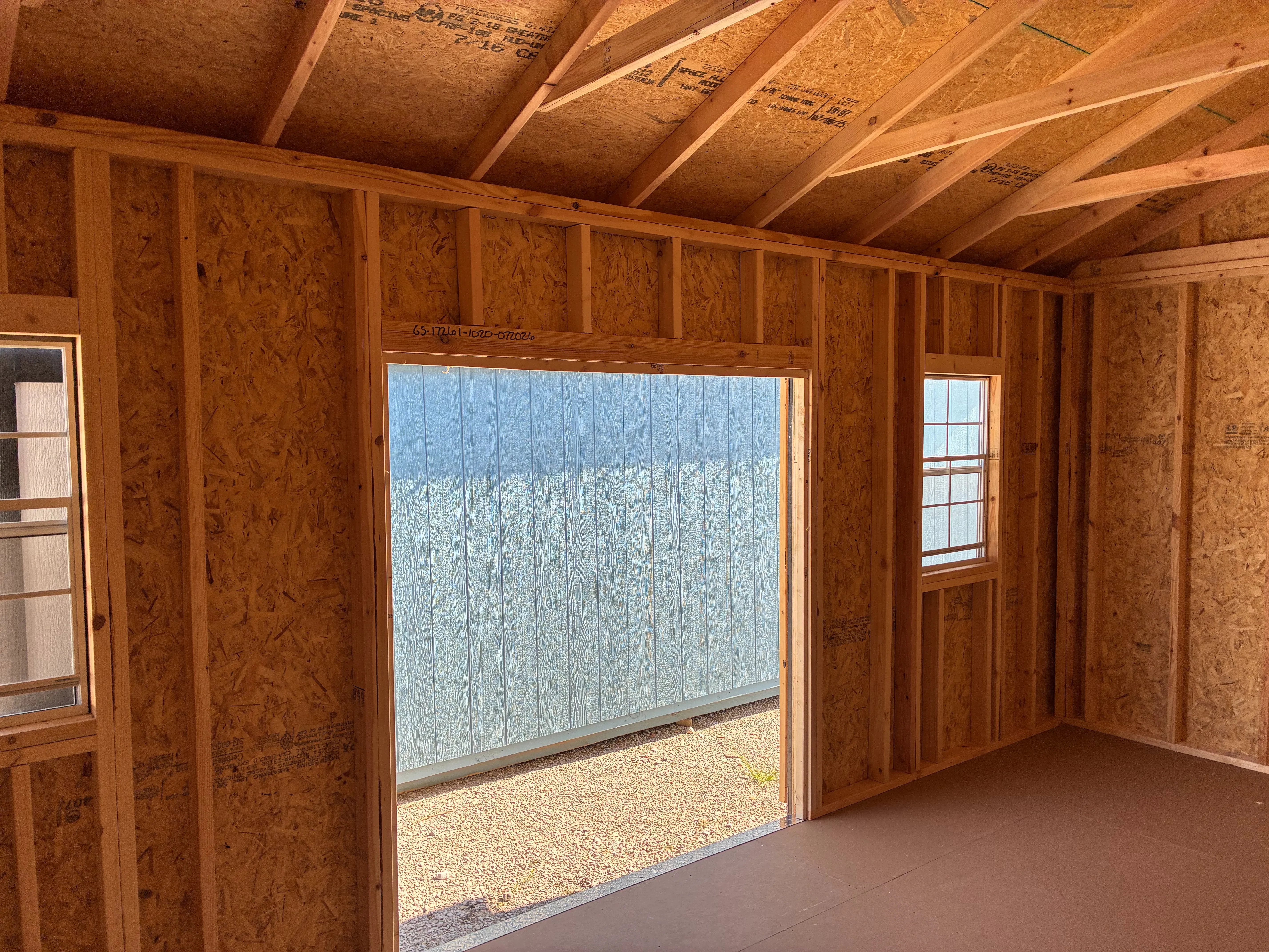 interior 10x20 garden shed showing 72" doors and 2 24'x36' windows