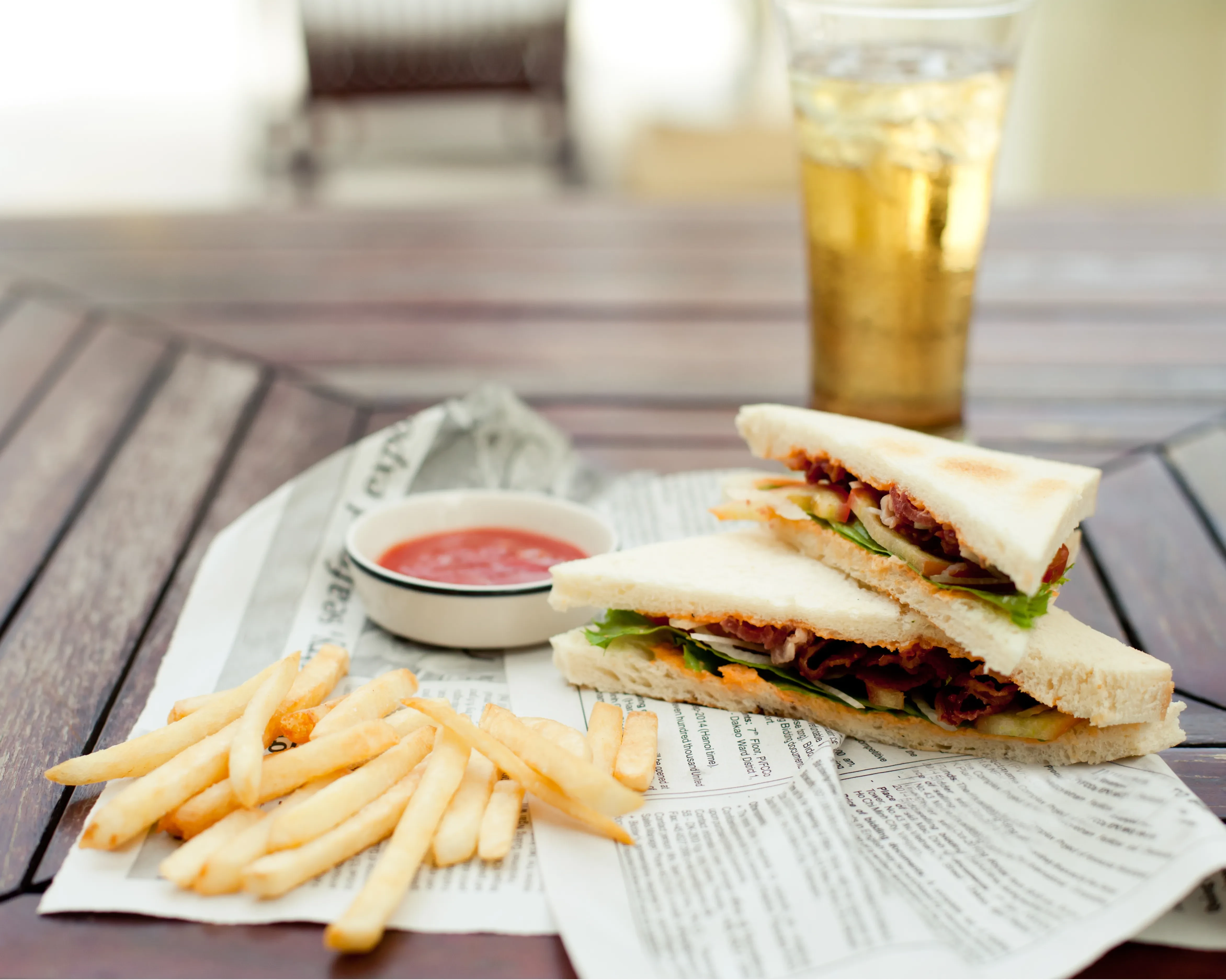 Lunch and a drink on a patio table