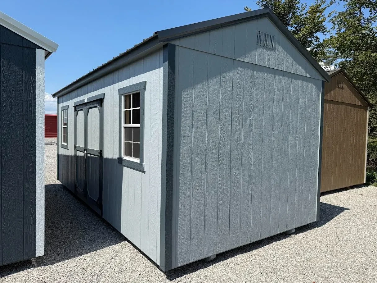 The outside of of a Light Gray and Slate Gray 10x20 Garden Shed with double doors and two windows in the side