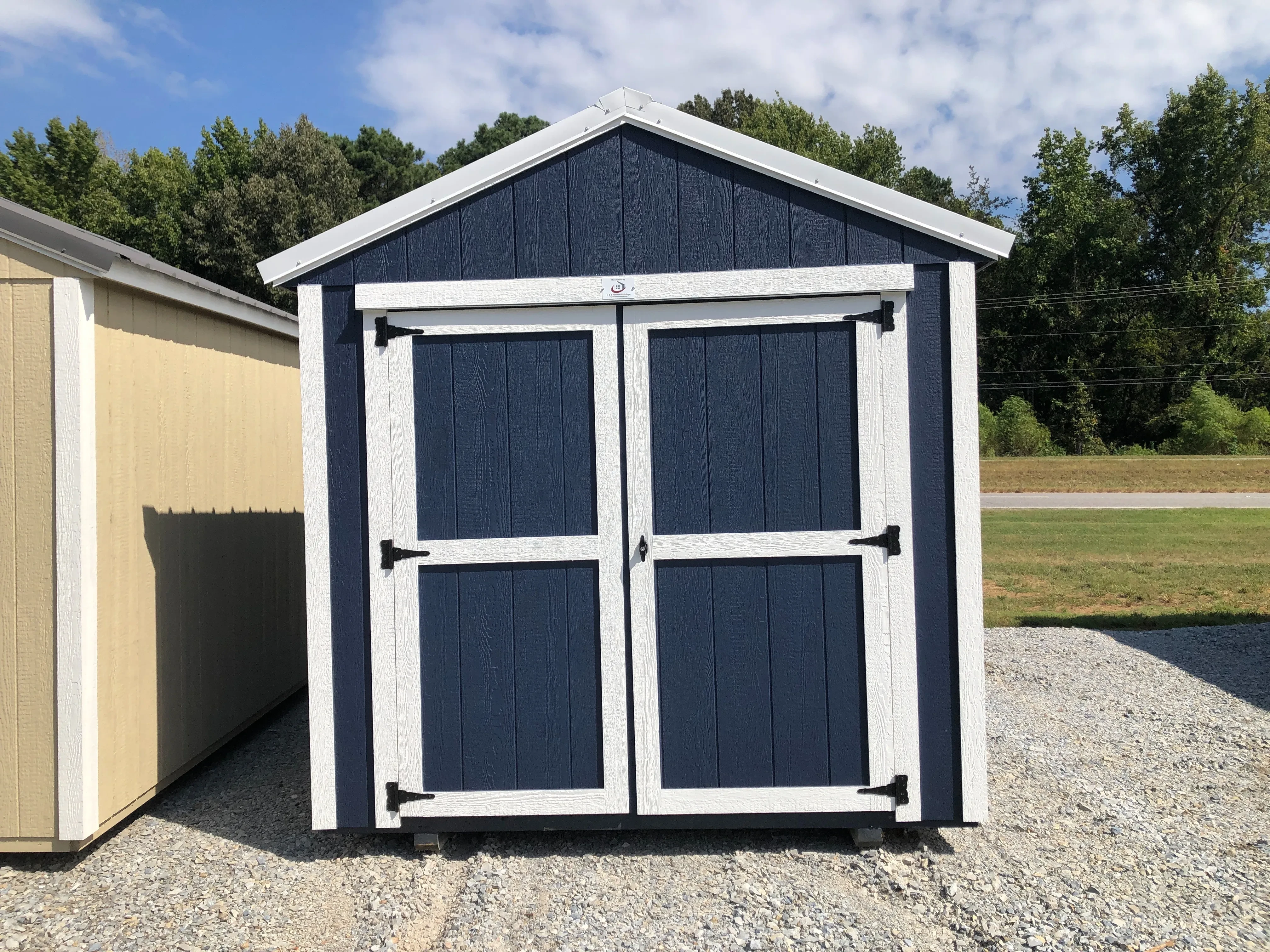 exterior of 8x12 utility shed showing the double doors