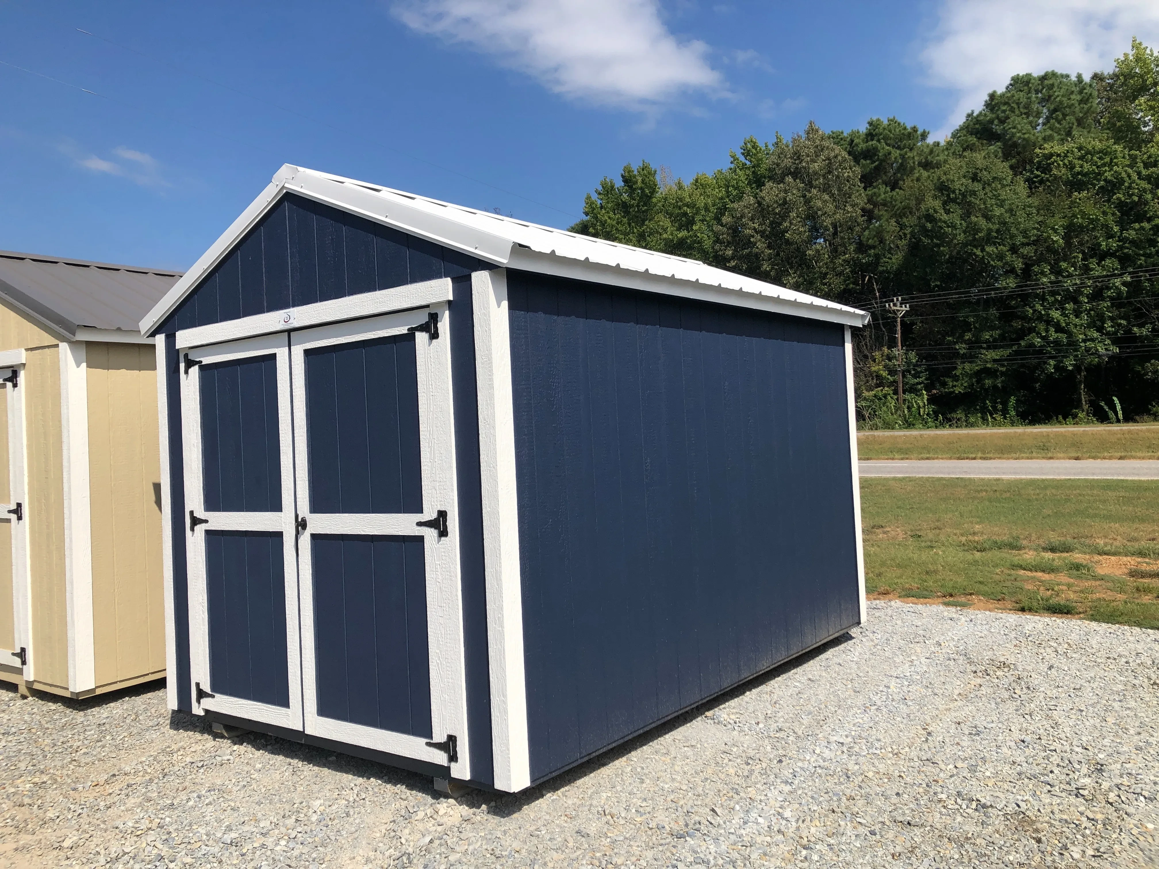 exterior of 8x12 utility shed showing the double doors