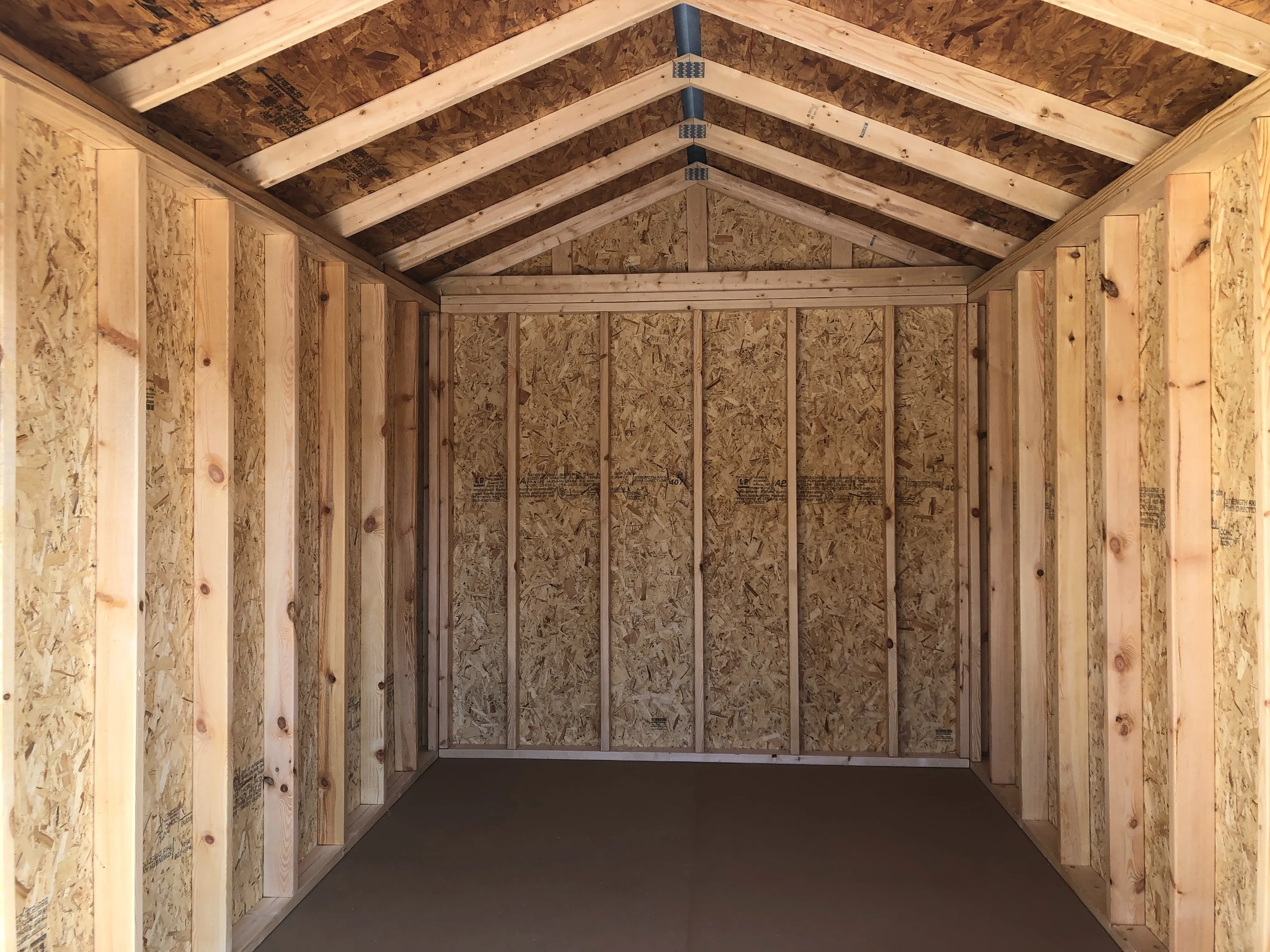 interior of 8x12 utility shed showing the inside walls and floor