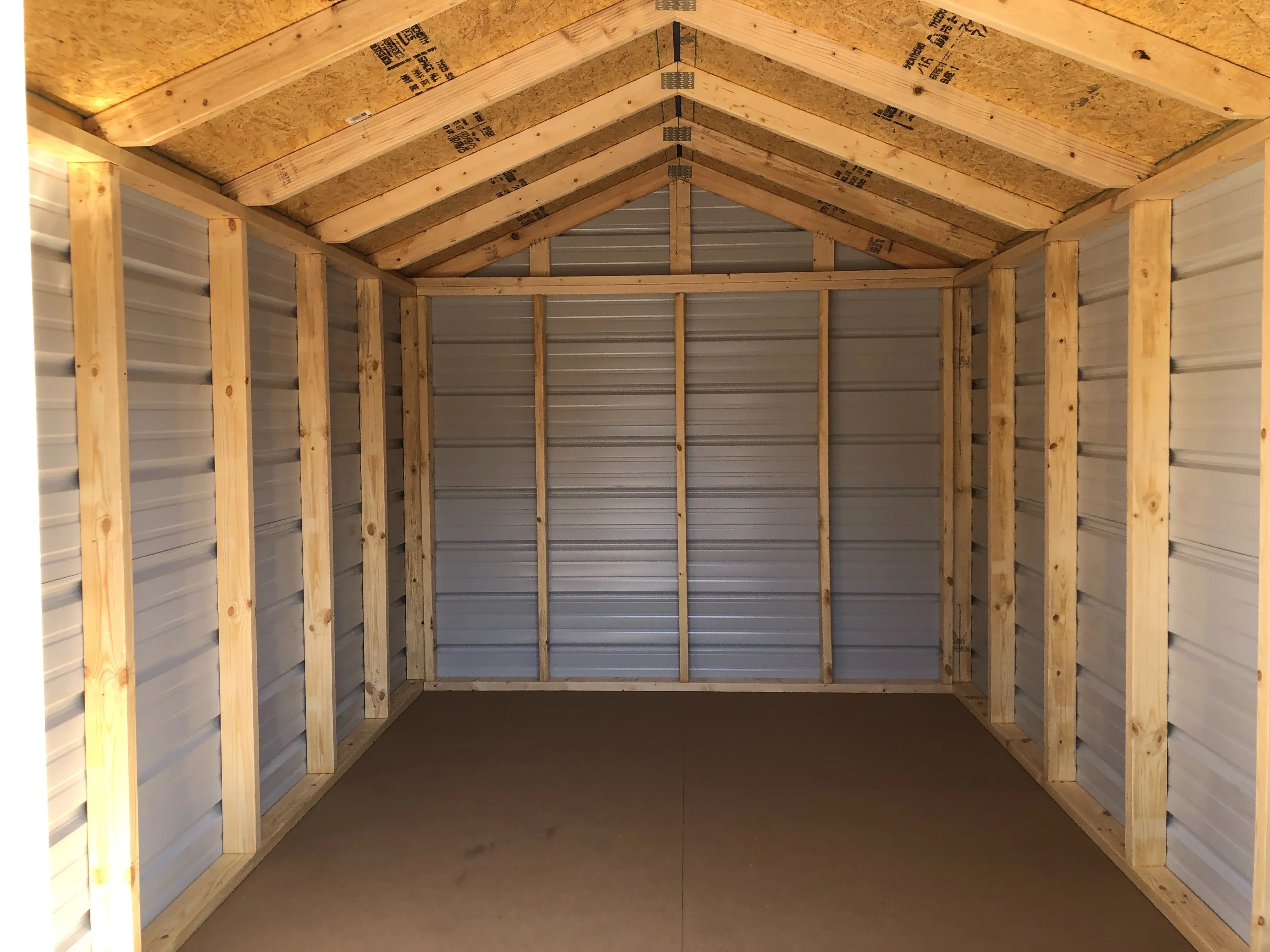 interior of 8x12 economy metal utility shed showing the inside walls and floor