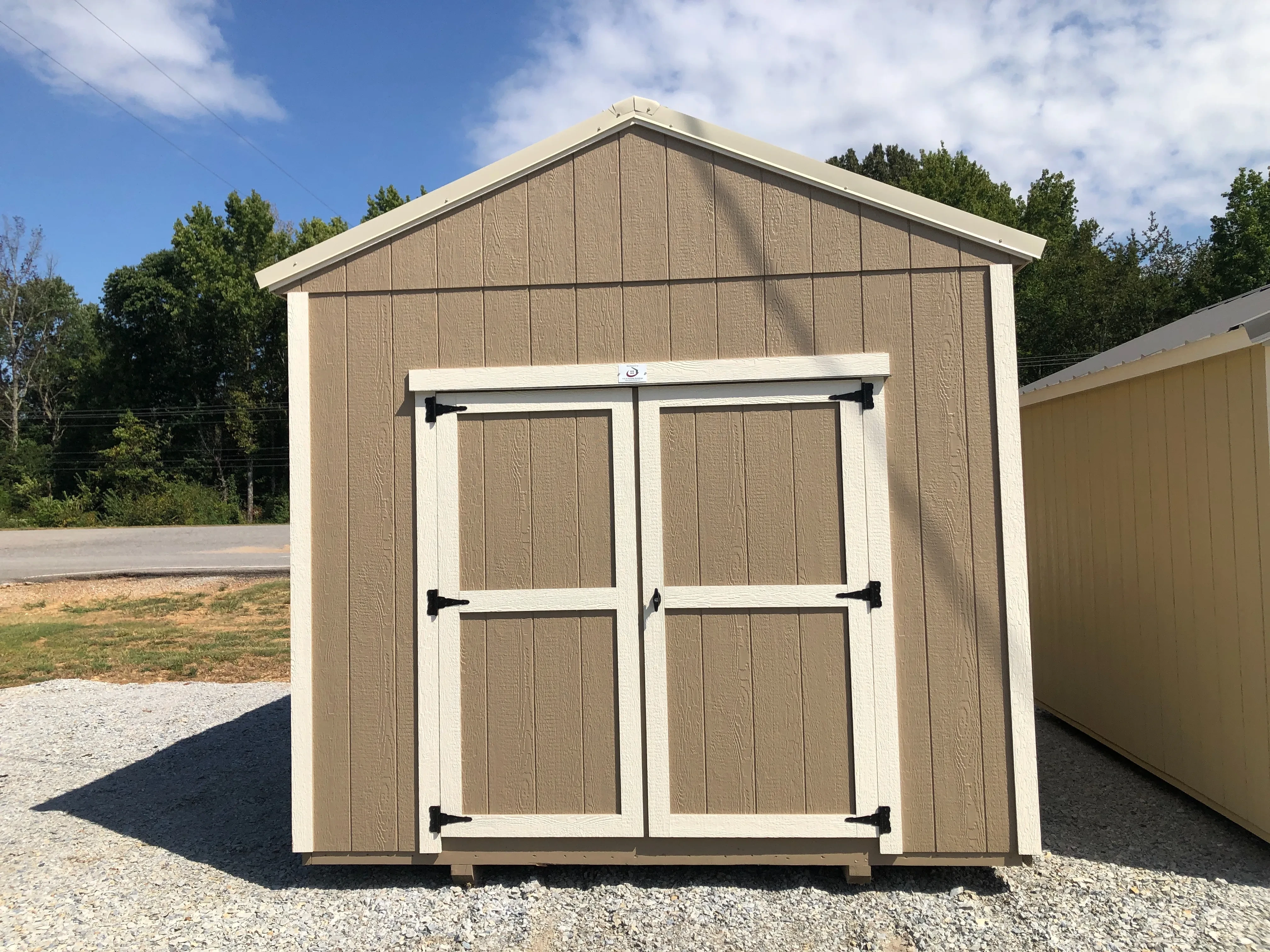 exterior of 10x16 utility shed showing double doors