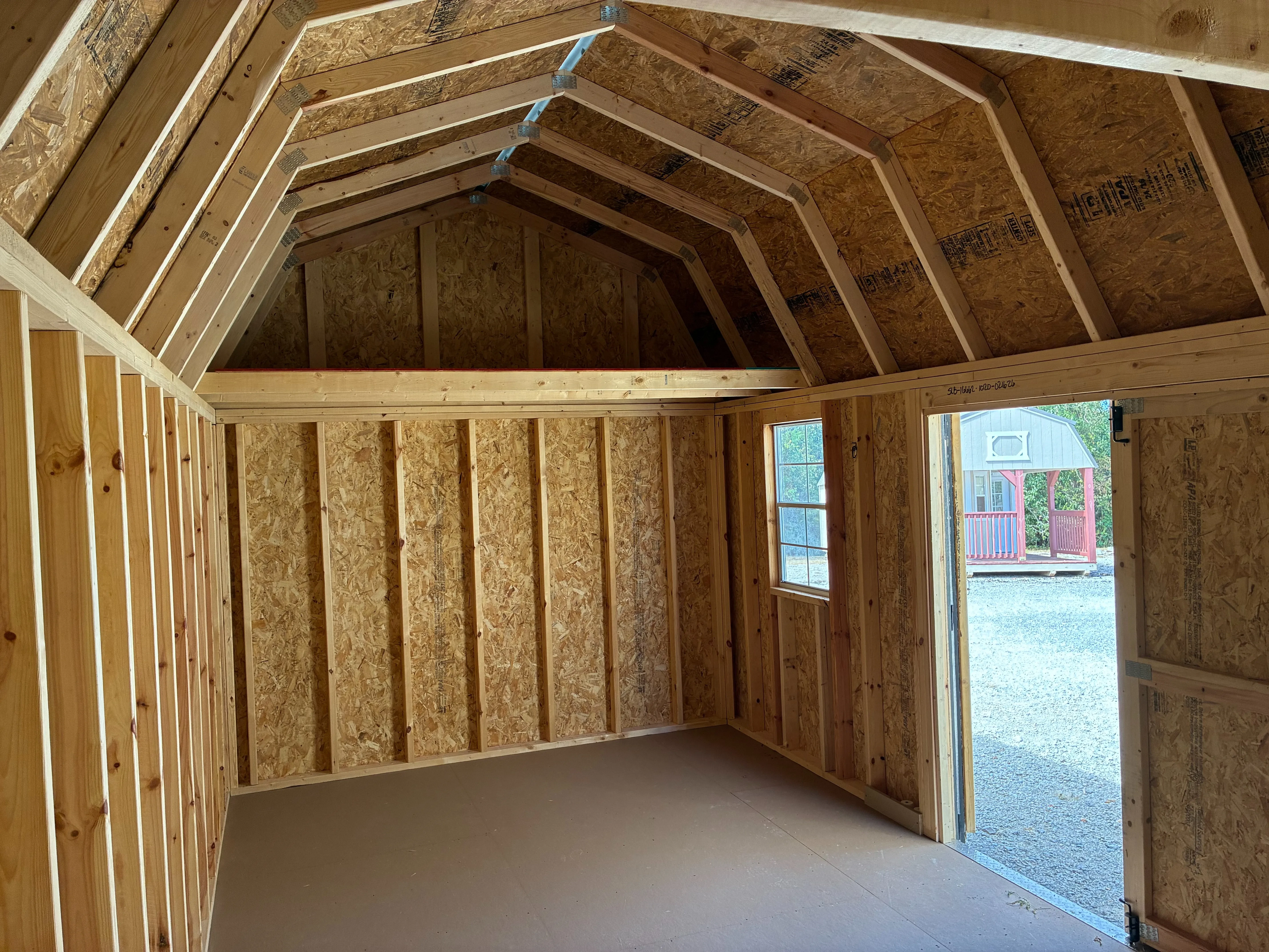 interior of 10x20 side lofted barn showing loft