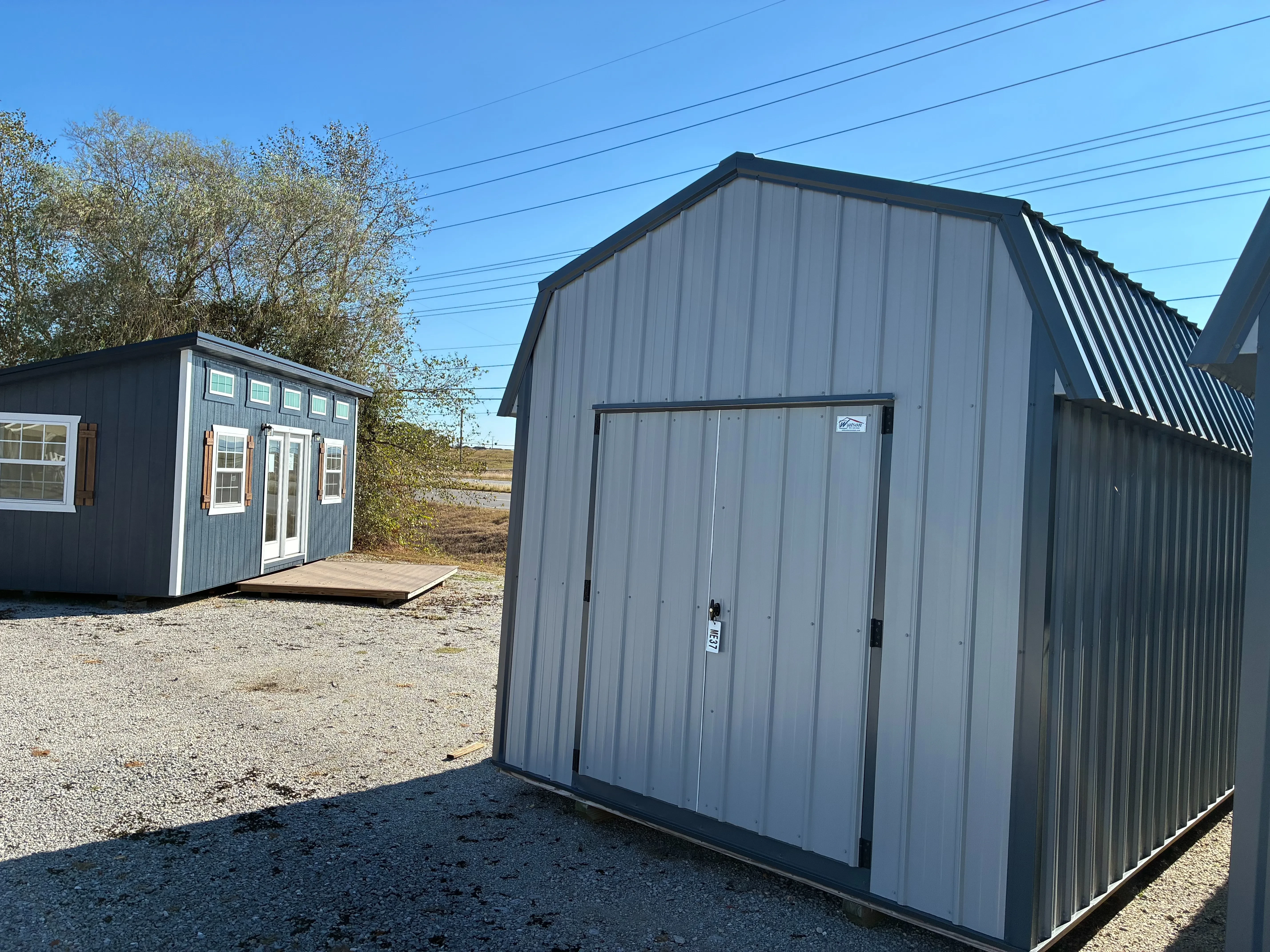 Exterior of 10x16 Classic Metal Lofted Barn showing double doors
