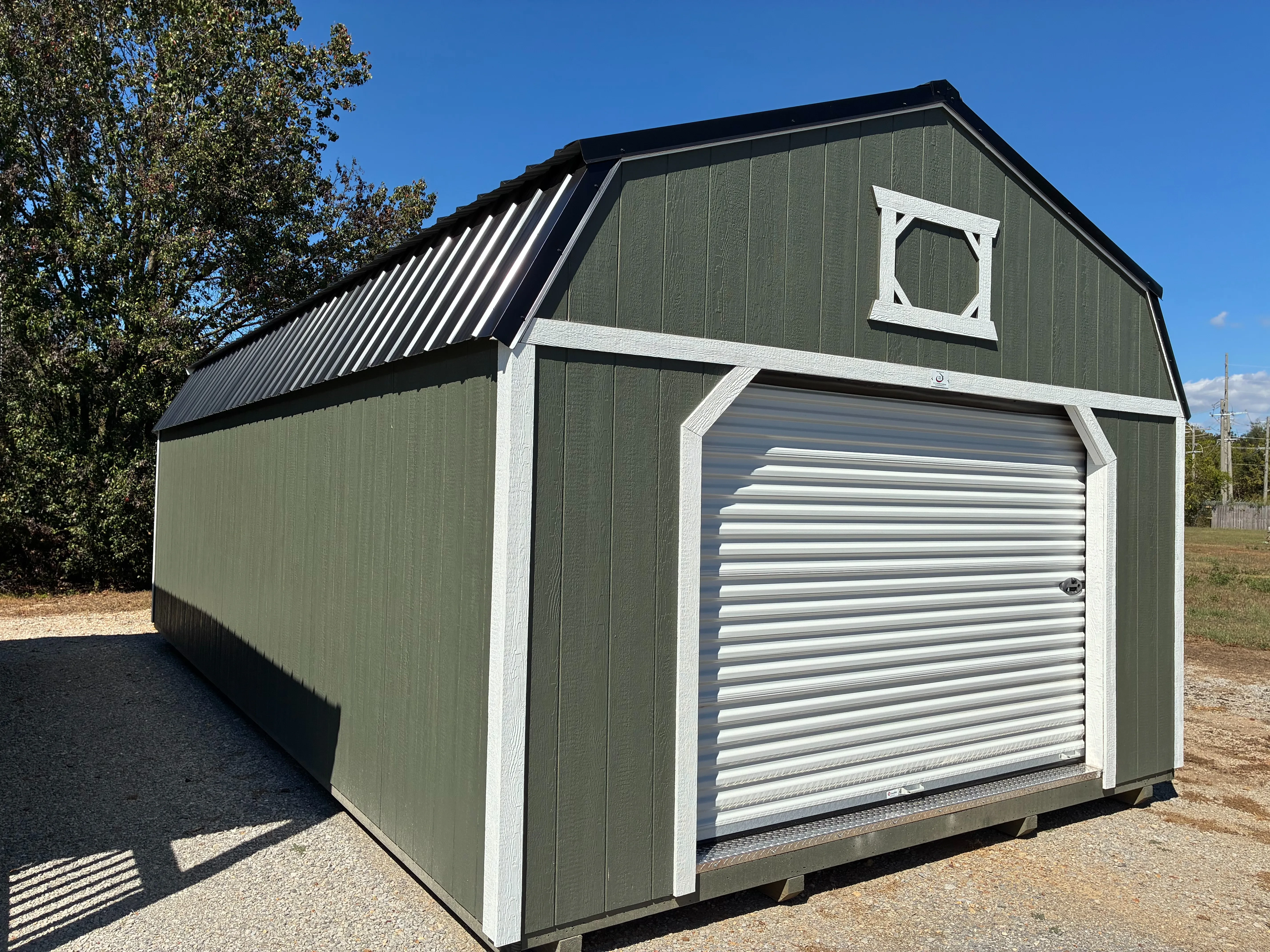 Exterior of 14x28 Classic Wood Lofted Garage showing 9'x7' roll up door