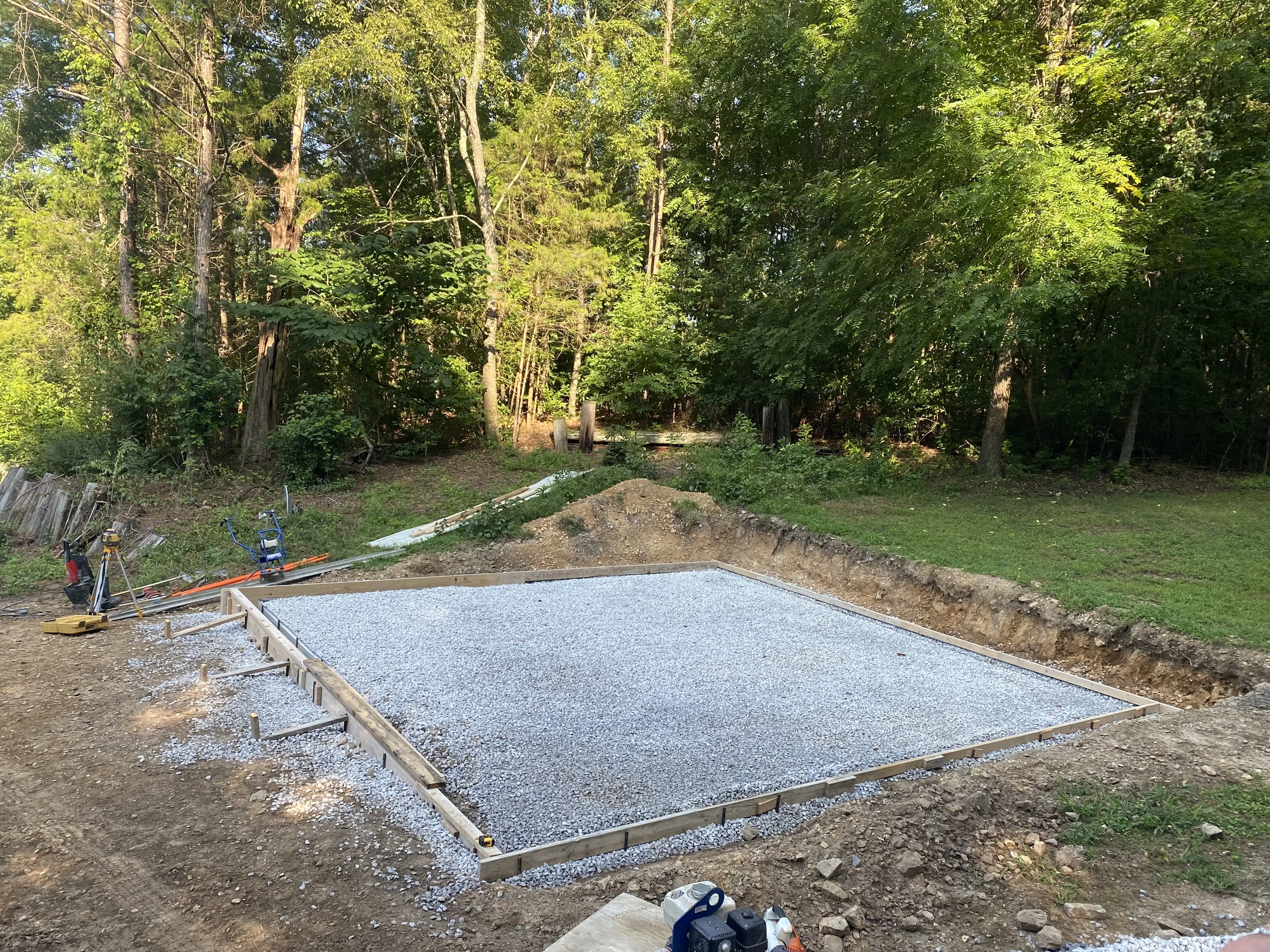 Garage site with pad formed up for concrete.