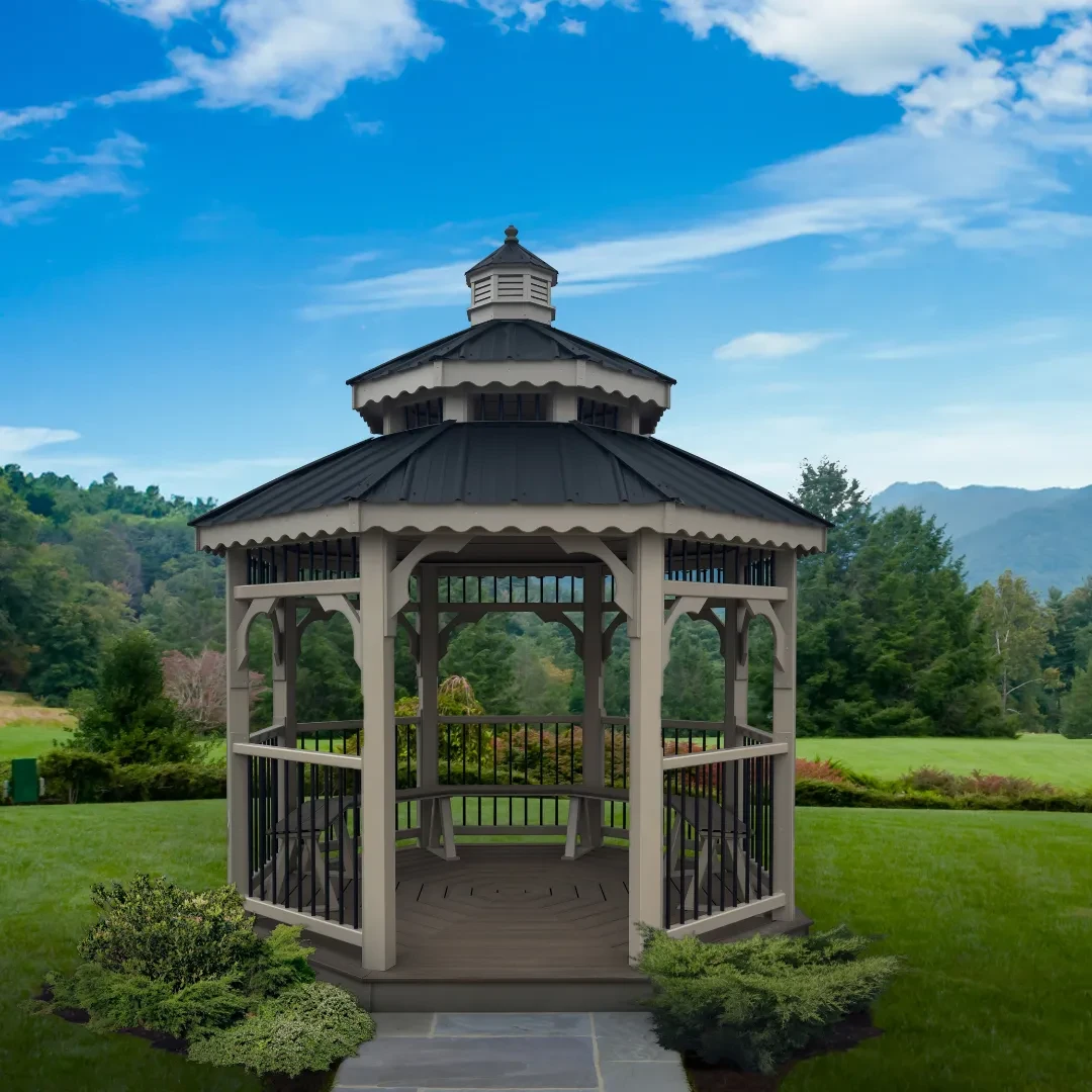 A gazebo with landscaping and mountains in the background