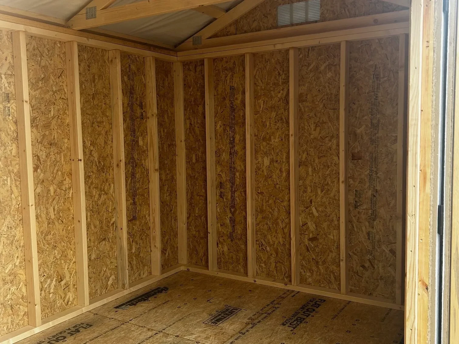 The corner of a wood shed