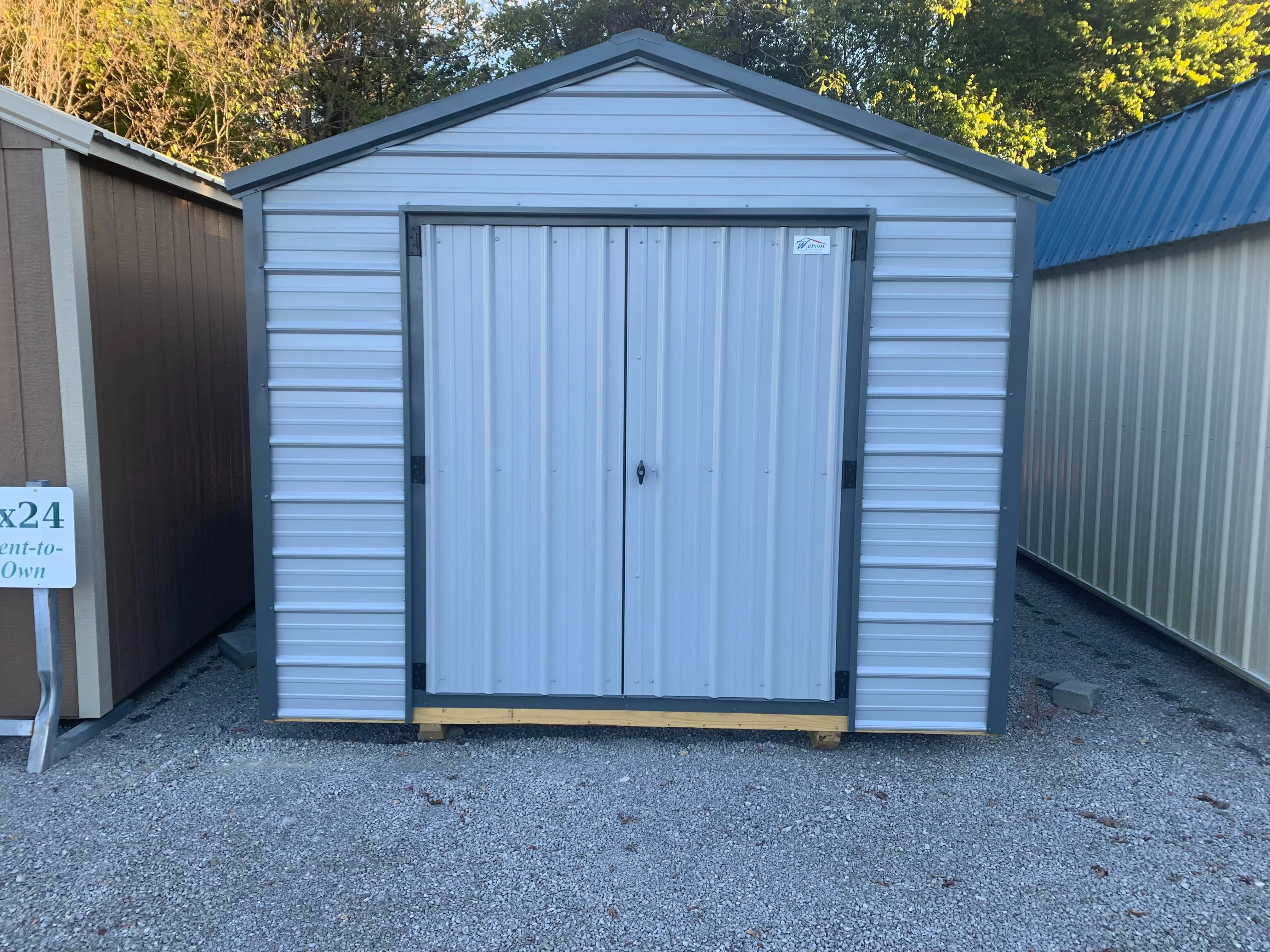 10x20 Metal Value shed with 72" double doors lifetime floors. Light Gray with slate gray roof and trim