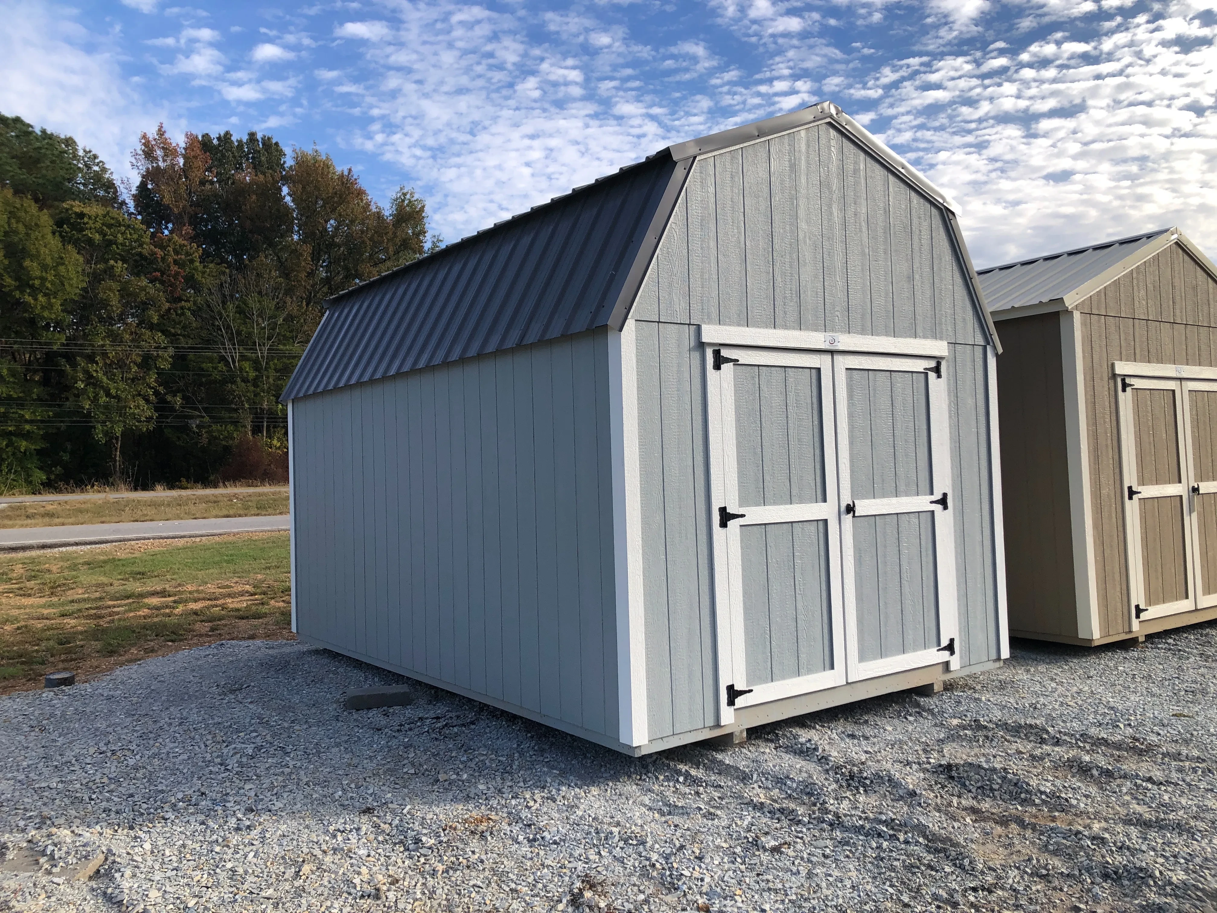 showing exterior of 10x16 lofted barn with double doors