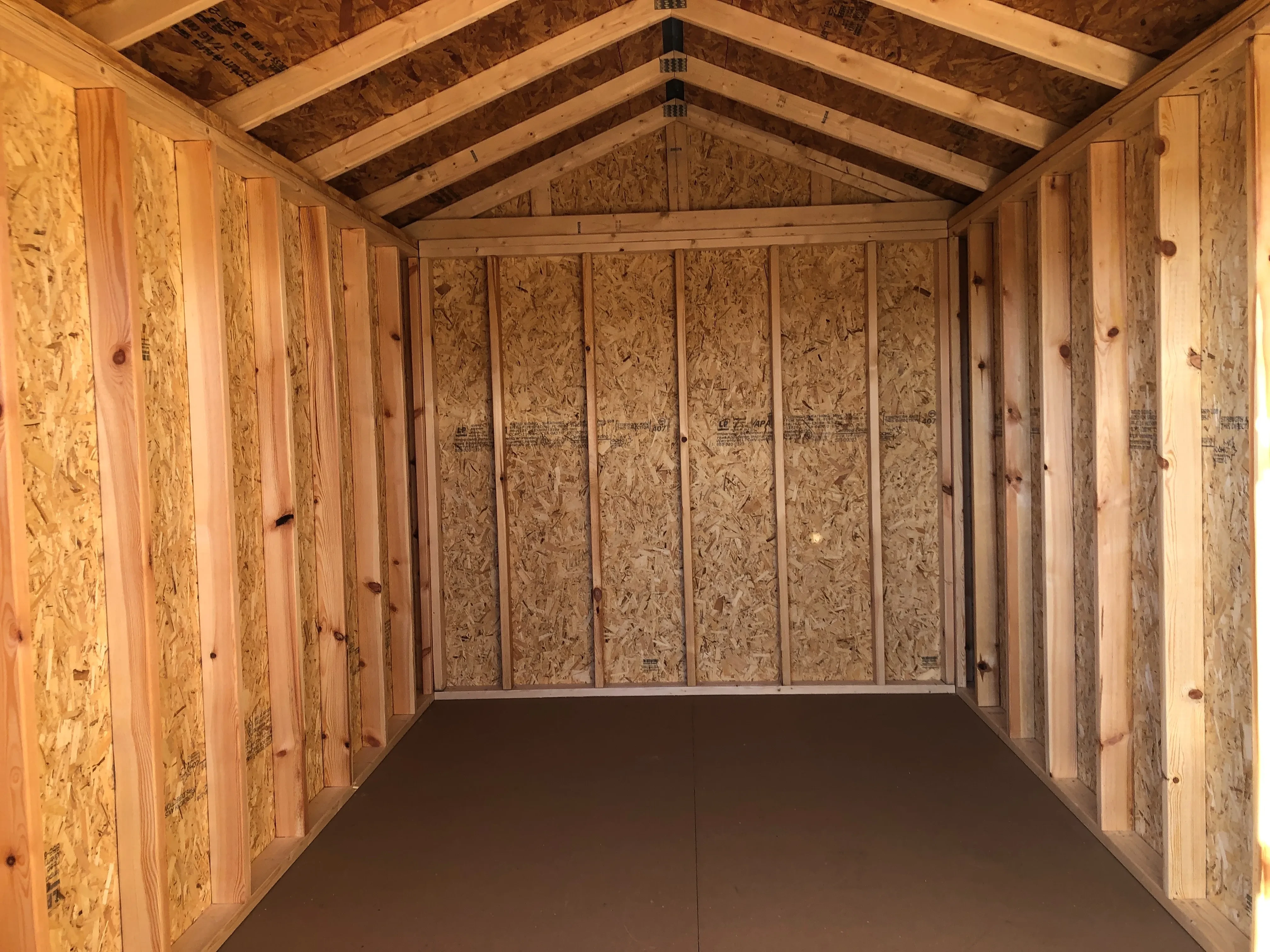 interior of utility shed showing floor and walls