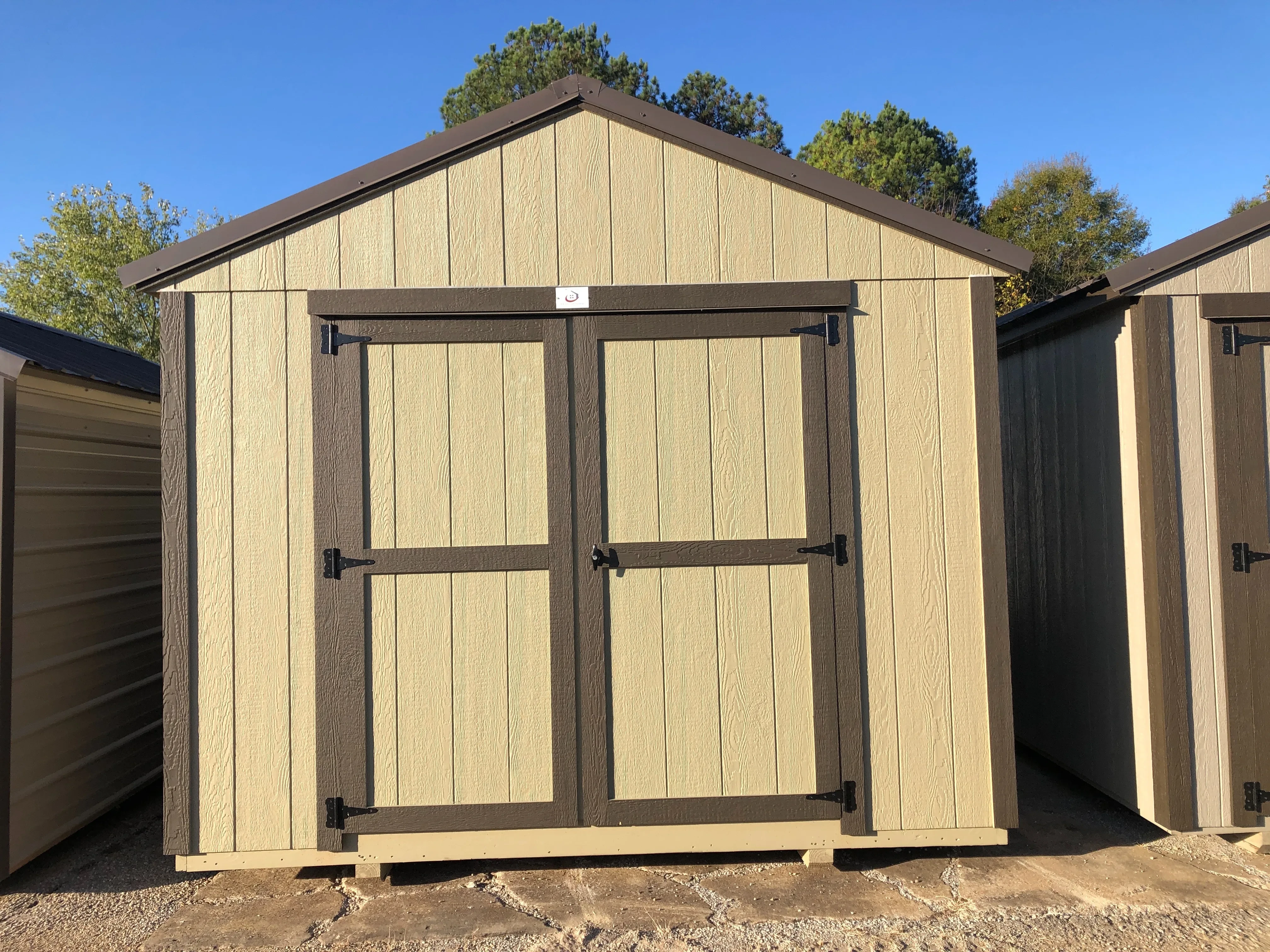 exterior of 10x12 utility shed showing double doors