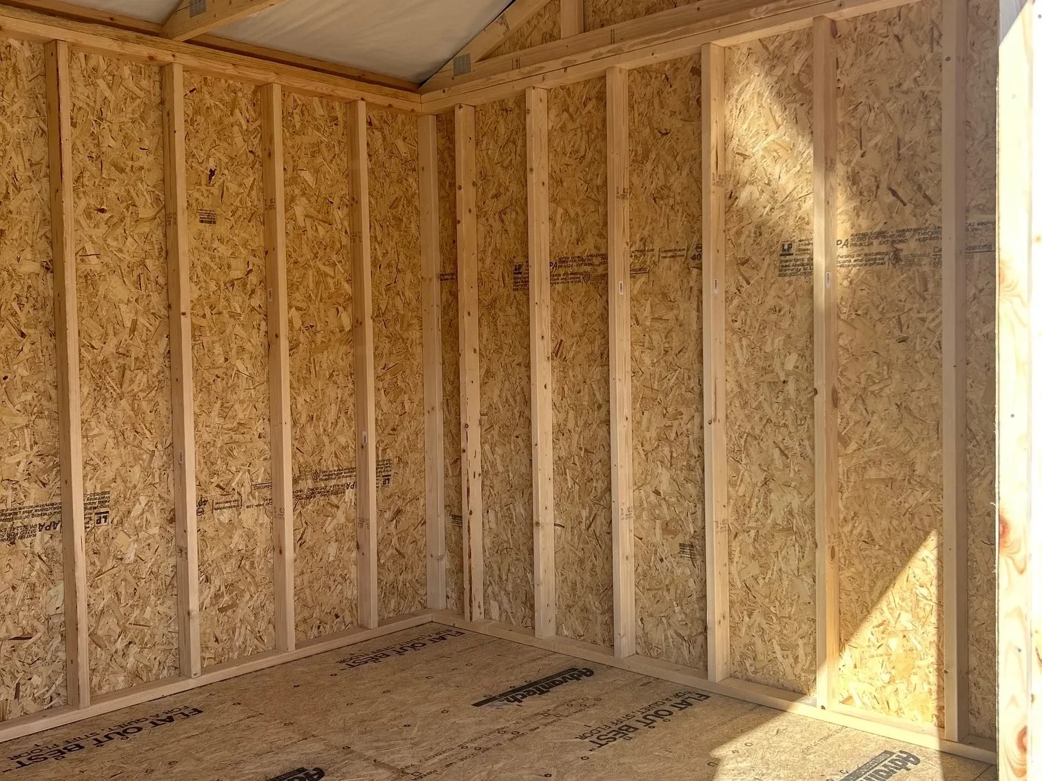 the inside corner of a wood shed